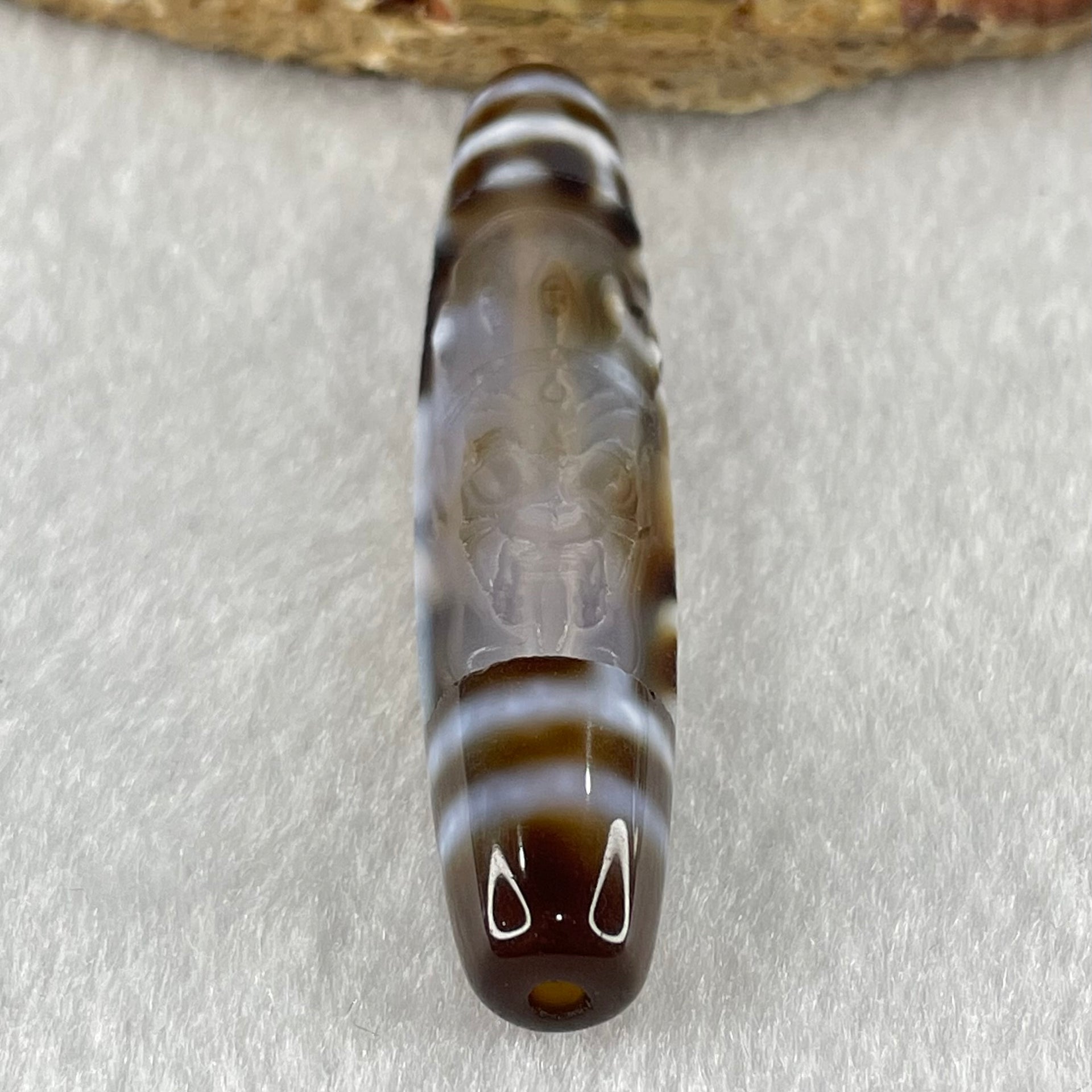 Natural Powerful Tibetan Old Oily Agate Zha Ji La Mu Female Cai Shen Carvings on 9 Eyes Dzi Bead Heavenly Master (Tian Zhu) 九眼扎基拉姆女财神天珠 11.04g 57.9 by 12.0mm - Huangs Jadeite and Jewelry Pte Ltd