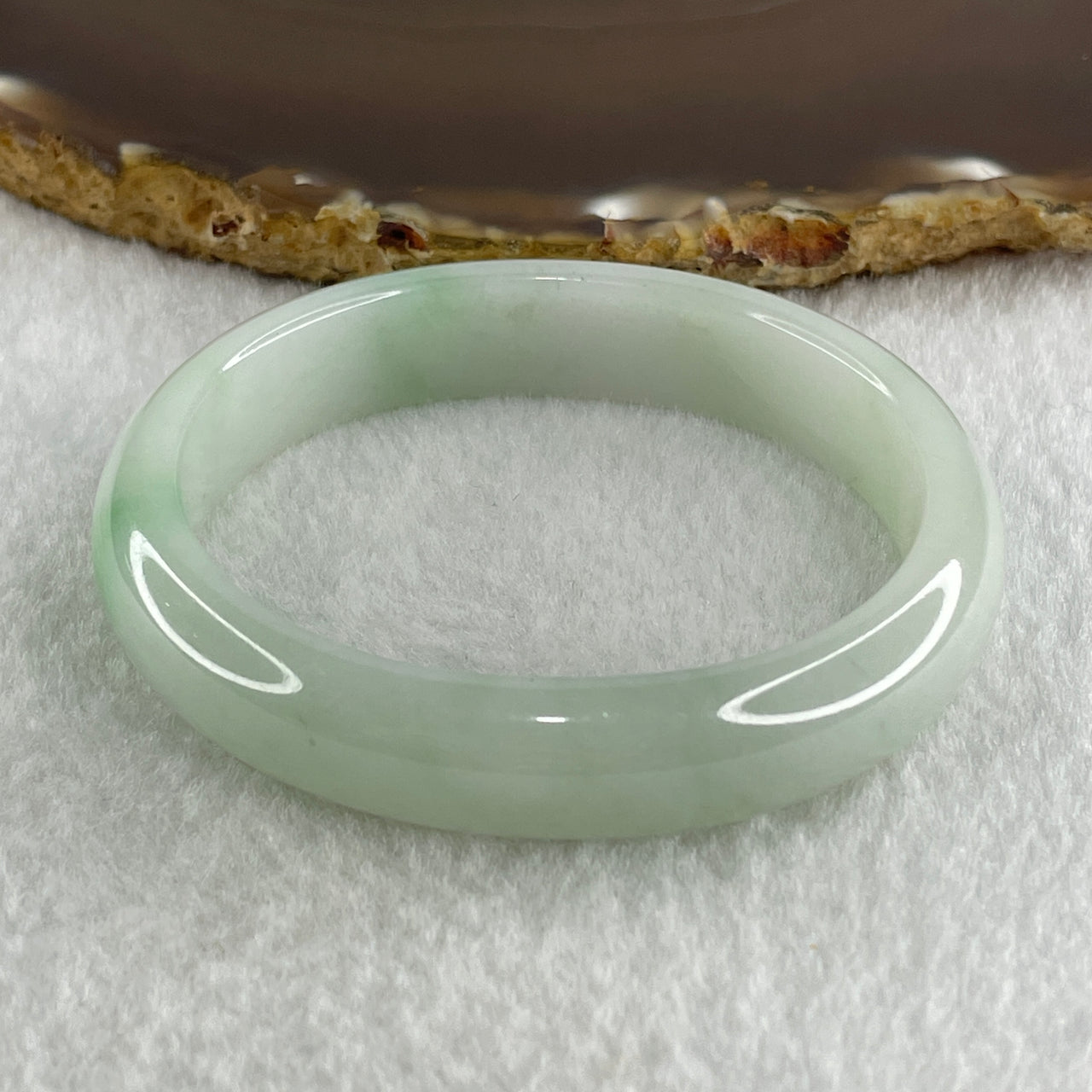 Type A Natural Light Green Faint Lavender with Emerald Green Patches Jadeite Oval Bangle 40.95g Inner Diameter 53.7mm 12.2 by 7.0mm (Internal Line) - Huangs Jadeite and Jewelry Pte Ltd