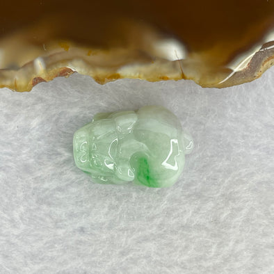 Type A Bright Green with Faint Lavender Jadeite Pixiu Pendent A货辣绿和浅紫罗兰翡翠貔貅吊坠 8.32g 22.8 by 16.2 by 12.0 mm - Huangs Jadeite and Jewelry Pte Ltd