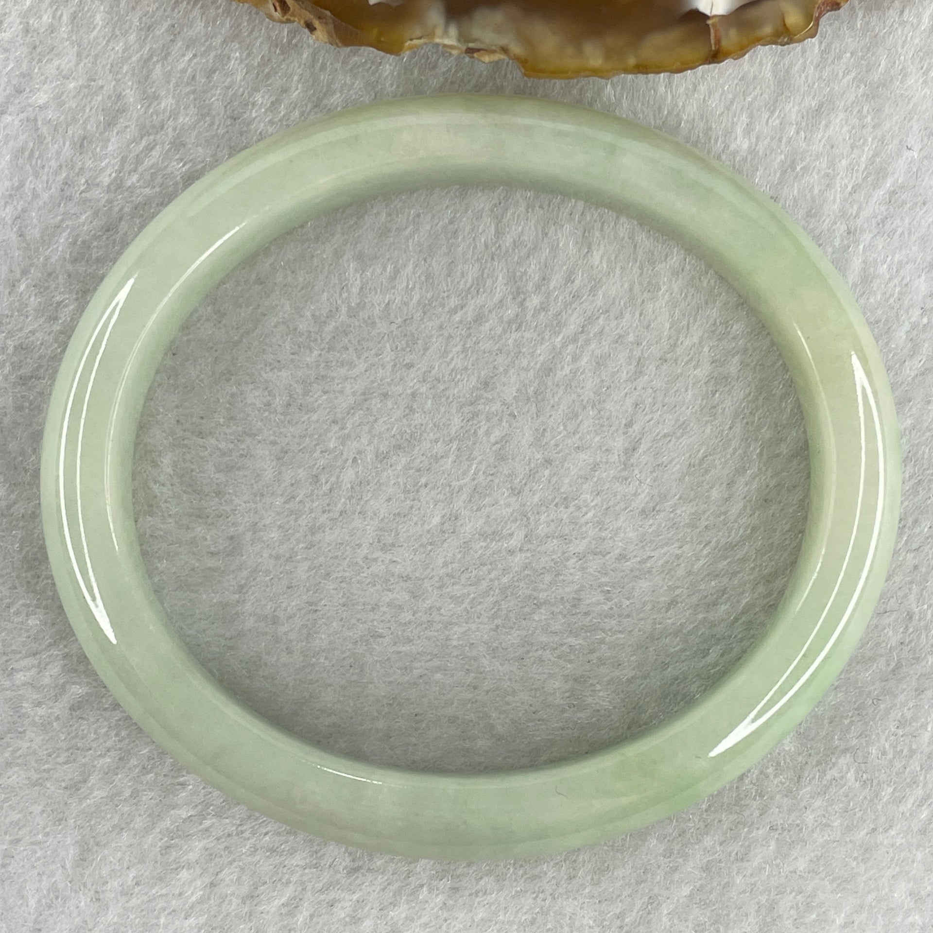 Natural Type A Light Apple Green Jadeite Oval Bangle 32.89g Inner Diameter 55.1mm Thickness 9.9 by 6.8mm (Close to Perfect) - Huangs Jadeite and Jewelry Pte Ltd