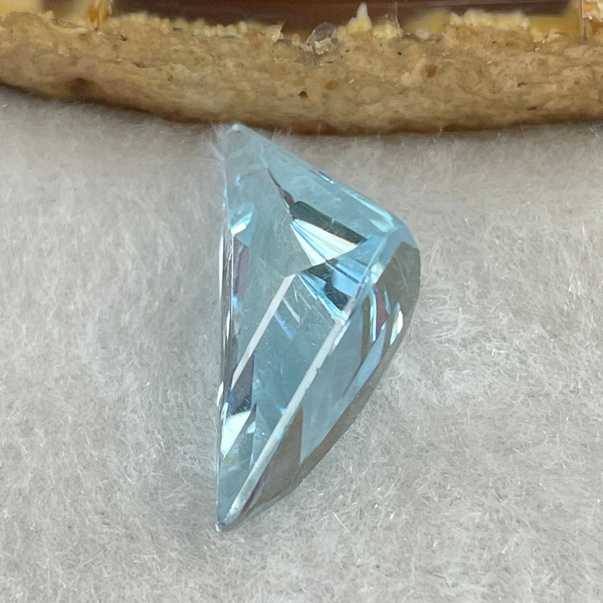 Natural Sky Blue Topaz Trillion Shape 10.32ct 21.3 by 12.4 by 7.9mm - Huangs Jadeite and Jewelry Pte Ltd