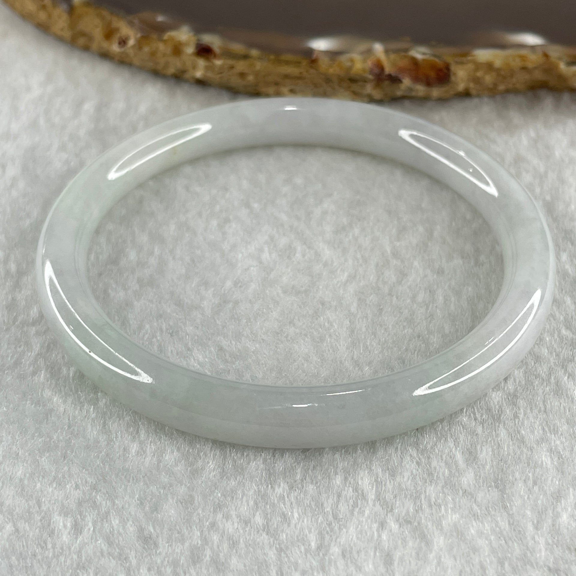 Type A Natural Light Green with Faint Lavender Jadeite Bangle 25.54g Internal Diameter 55.9mm 7.6 by 6.9mm (Very Slight Internal Lines) - Huangs Jadeite and Jewelry Pte Ltd