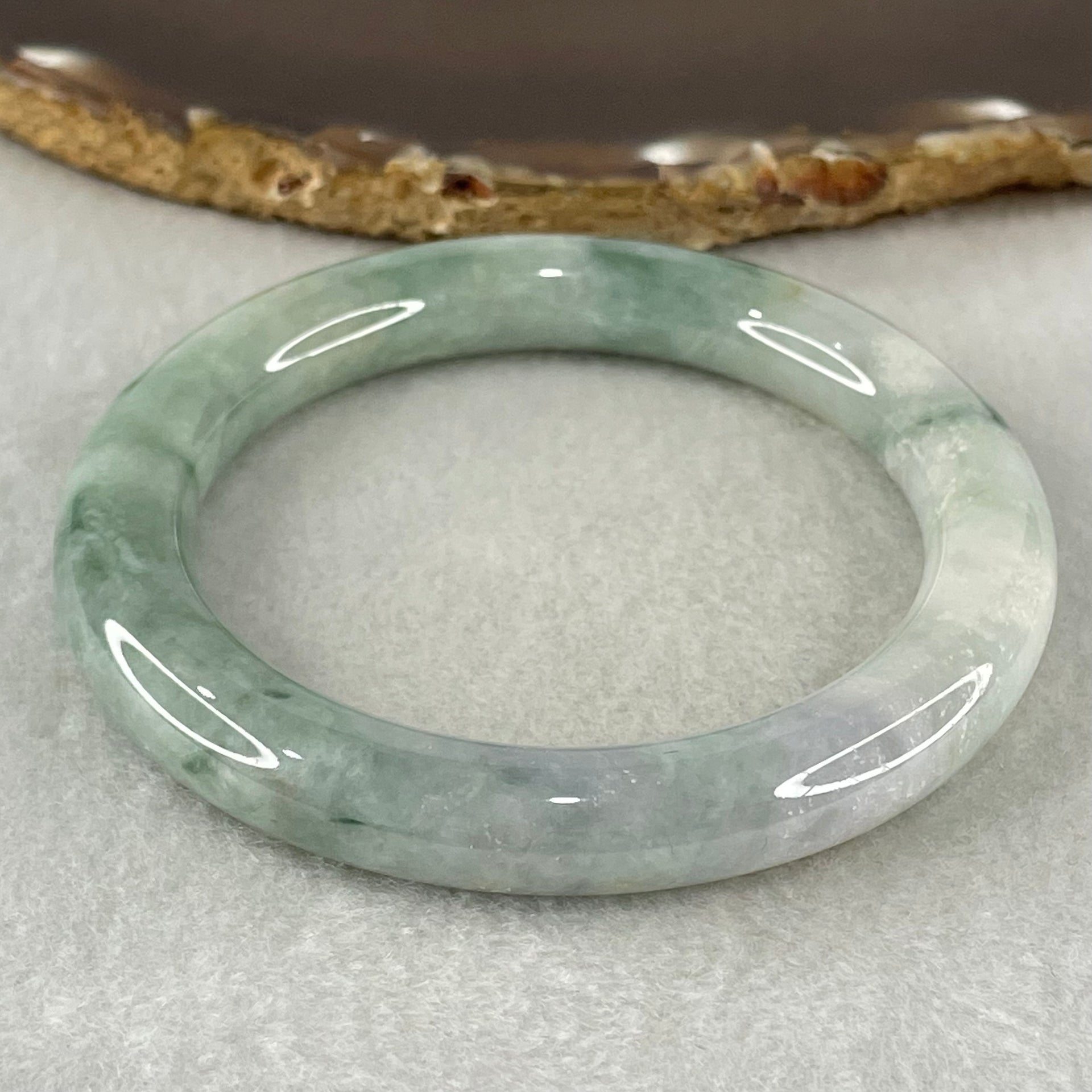 Type A Light Green with Green piao Hua Floral Jadeite Bangle 54.80g Inner Diameter 55.9mm 10.2 by 10.6mm (Internal Lines) - Huangs Jadeite and Jewelry Pte Ltd