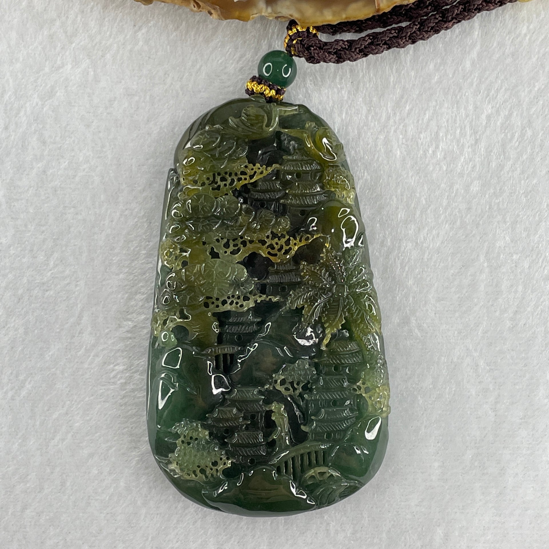Grand Master Type Green with Brownish Yellow Jadeite Shan Shui with Gui Ren Pendant 112.63g 80.3 by 46.8 by 13.0mm - Huangs Jadeite and Jewelry Pte Ltd