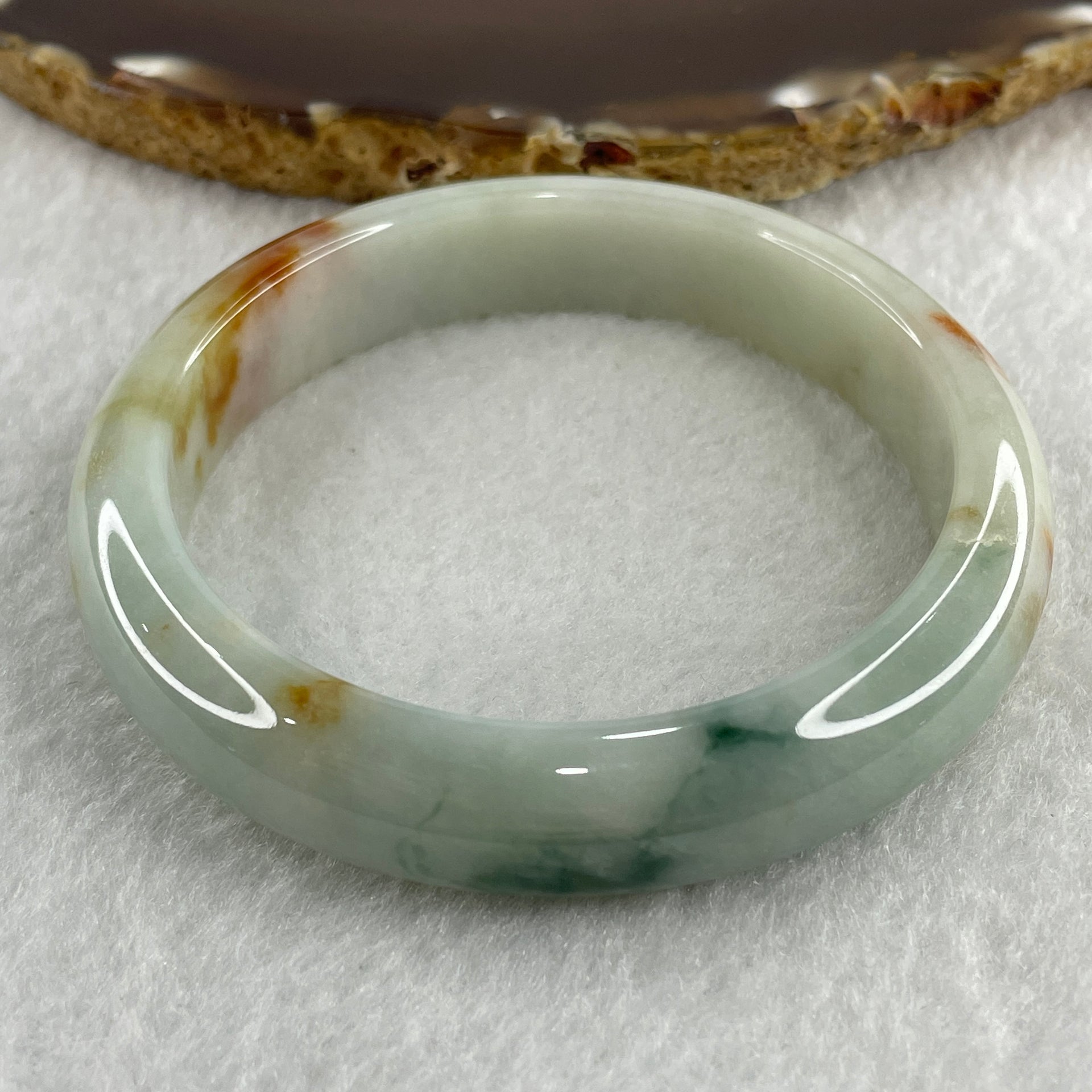Type A Natural Light Green with Spicy Green and Brownish Patches Jadeite Bangle 55.09g Inner Diameter 57.5mm 12.7 by 9.0mm (Slight External Rough) - Huangs Jadeite and Jewelry Pte Ltd