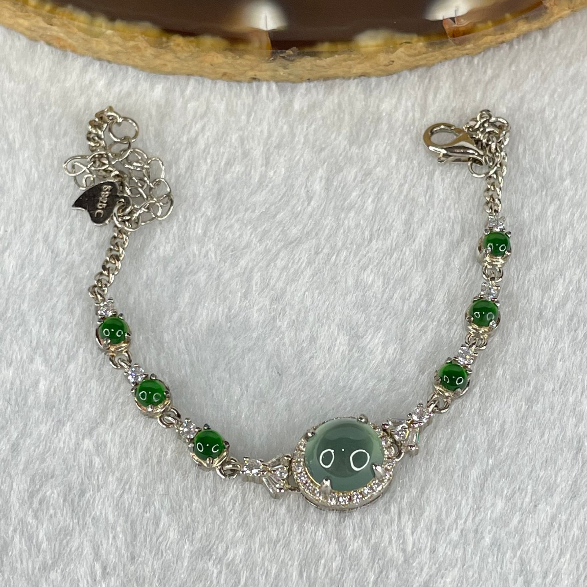 Type A Icy Blueish Green 7.2 by 5.0mm and Icy Green Omphasite Jadeite Cabochon With Crystals in S925 Sliver Bracelet 4.70g - Huangs Jadeite and Jewelry Pte Ltd