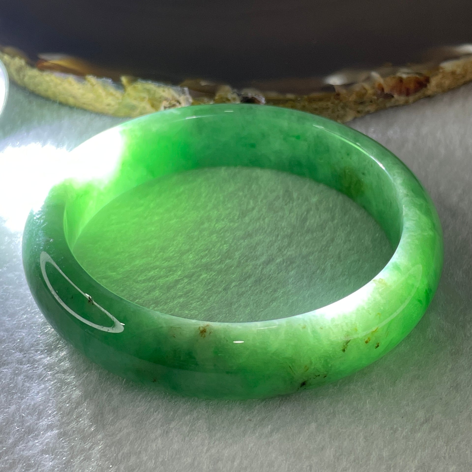 Certified Natural Type A Bright Green with Emerald Green and Brownish Fluorite Piao Hua Jadeite Bangle 55.93g Internal Diameter 57.3mm 13.4 by 8.1mm ( Very Very Slight Internal Line) ( Very Very External Rough) - Huangs Jadeite and Jewelry Pte Ltd