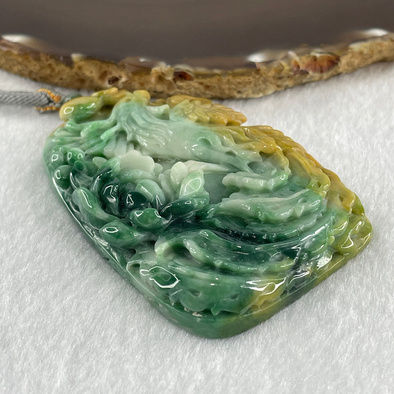 Grand Master Type A Green with Spicy Green and Yellow Piao Hua Jadeite Phoenix with Flower Double Side Pendant 86.78g 72.0 by 48.0 by 12.5mm