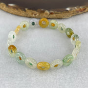 Natural Type A Muti Green with Lavender Yellowish Jadeite Donut Bracelet 12.17g 15.5cm 9.9 by 3.2mm 18 Ping An Kow - Huangs Jadeite and Jewelry Pte Ltd