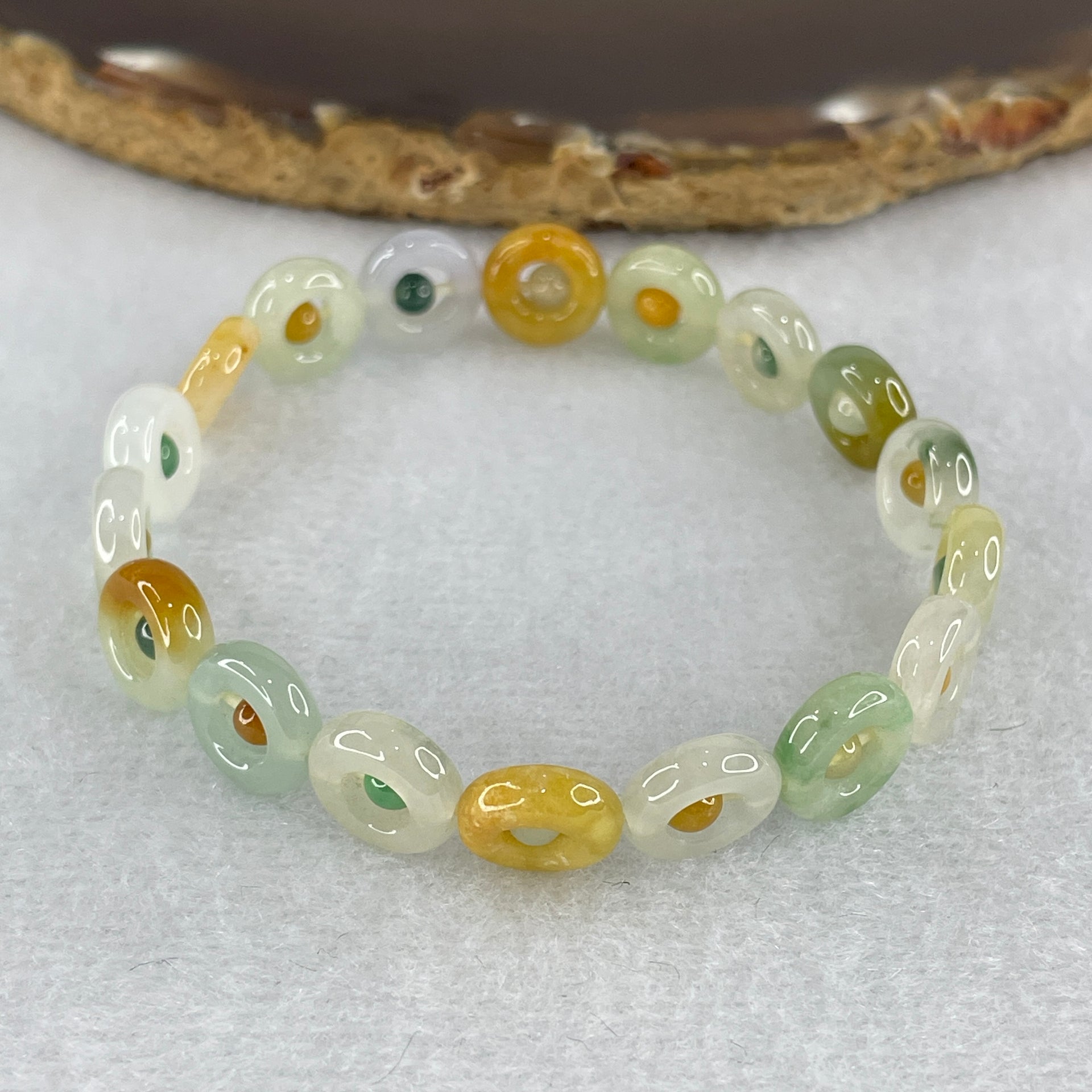Natural Type A Muti Green with Lavender Yellowish Jadeite Donut Bracelet 12.17g 15.5cm 9.9 by 3.2mm 18 Ping An Kow - Huangs Jadeite and Jewelry Pte Ltd