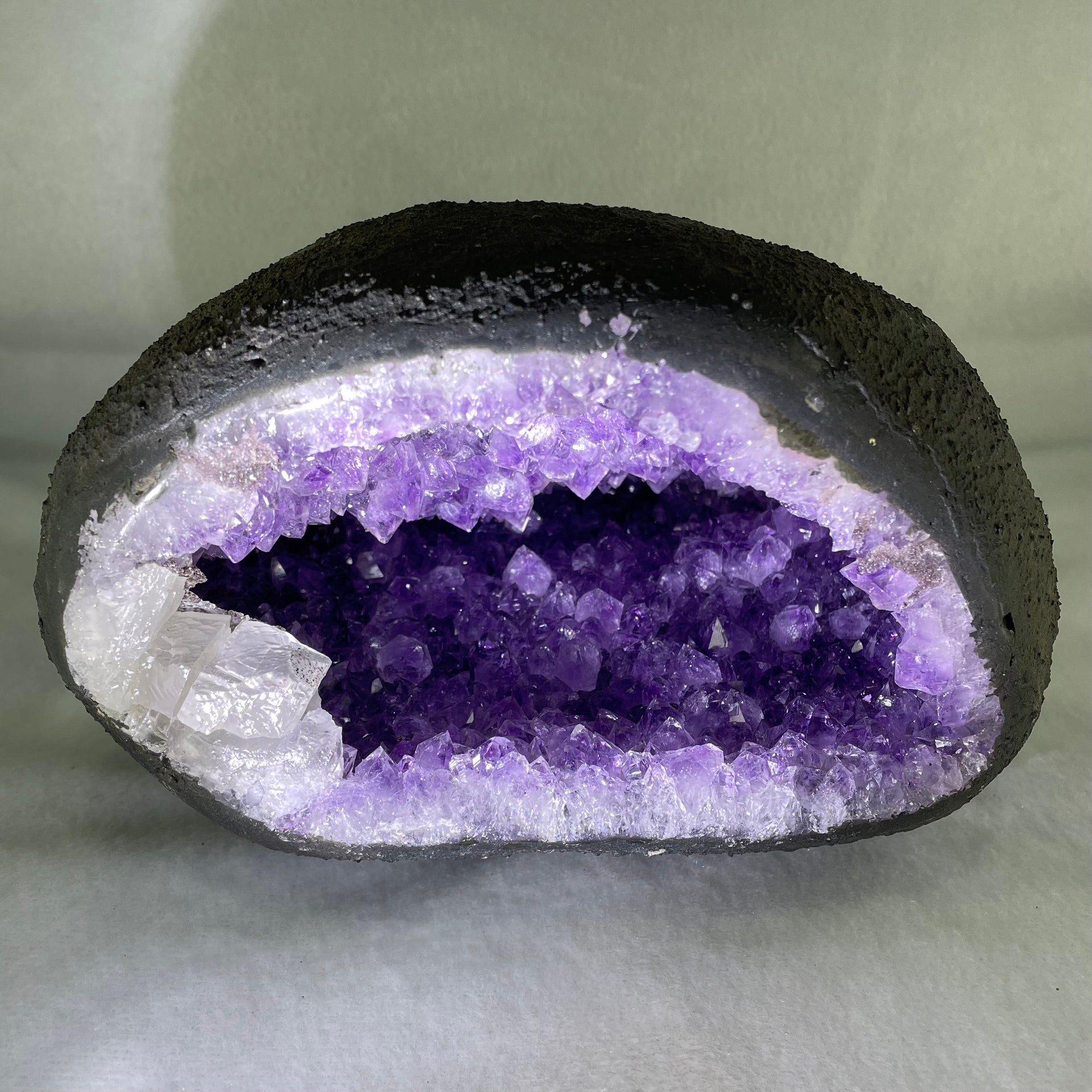 Natural Amethyst Cave with Wooden Stand 4,155.5g 190.0 by 160.0 by 195.0mm - Huangs Jadeite and Jewelry Pte Ltd
