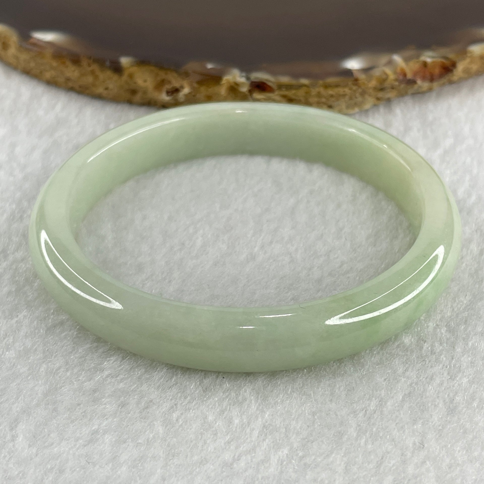 Natural Type A Light Apple Green Jadeite Oval Bangle 32.89g Inner Diameter 55.1mm Thickness 9.9 by 6.8mm (Close to Perfect) - Huangs Jadeite and Jewelry Pte Ltd