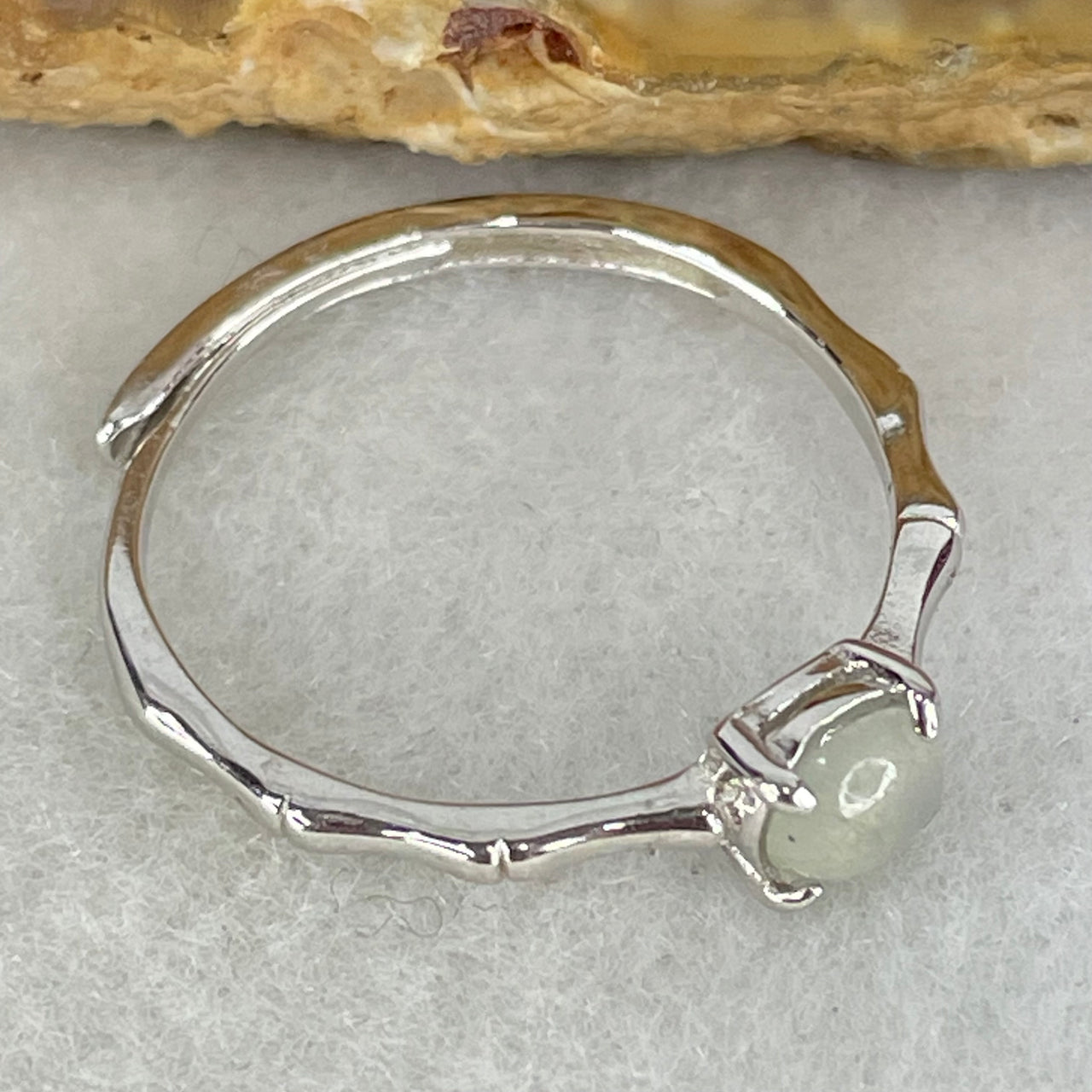 Type A Icy Faint Green Cabochon Jadeite in S925 Sliver Ring (Adjustable Size) 1.09g 5.0 by 2.0mm - Huangs Jadeite and Jewelry Pte Ltd