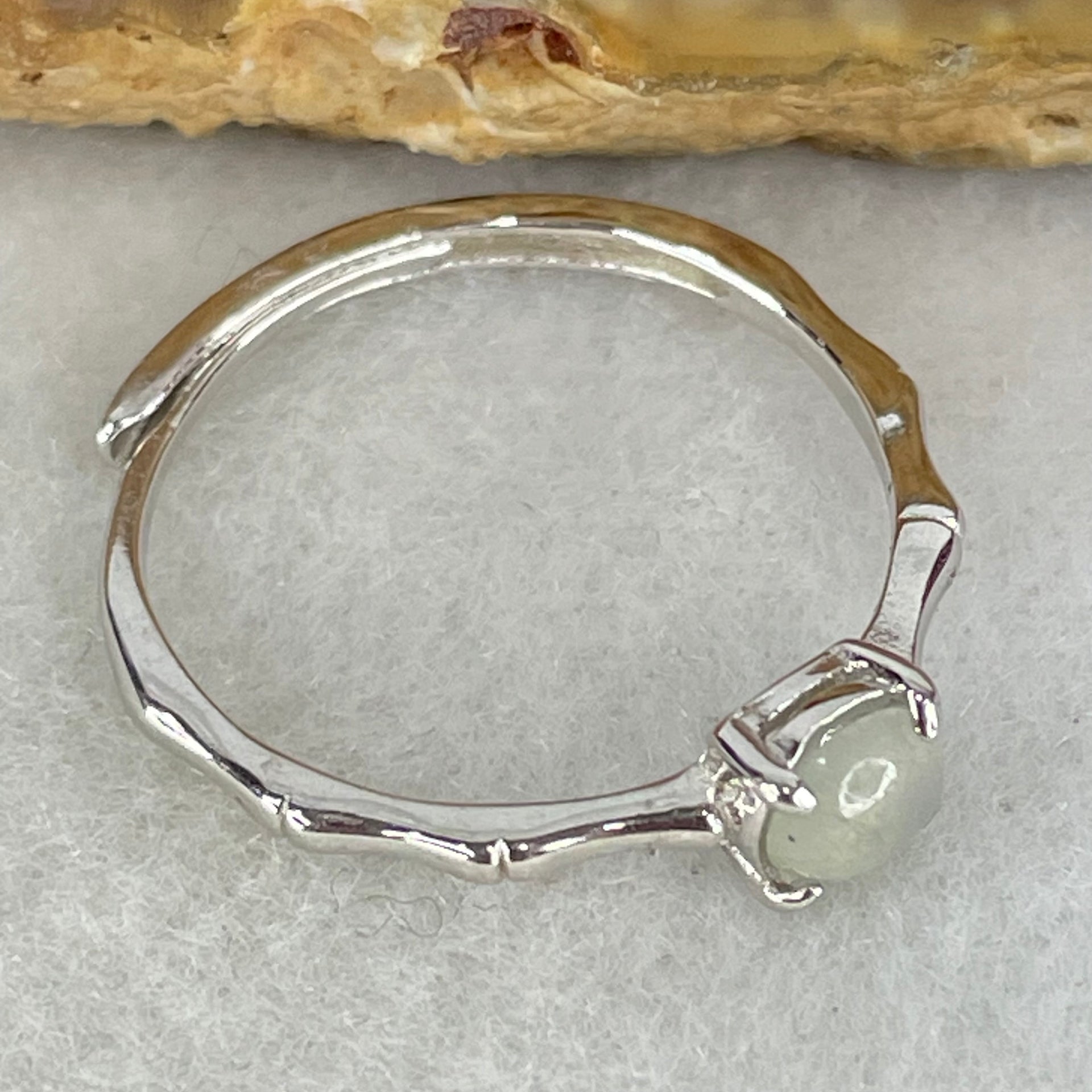 Type A Icy Faint Green Cabochon Jadeite in S925 Sliver Ring (Adjustable Size) 1.09g 5.0 by 2.0mm - Huangs Jadeite and Jewelry Pte Ltd