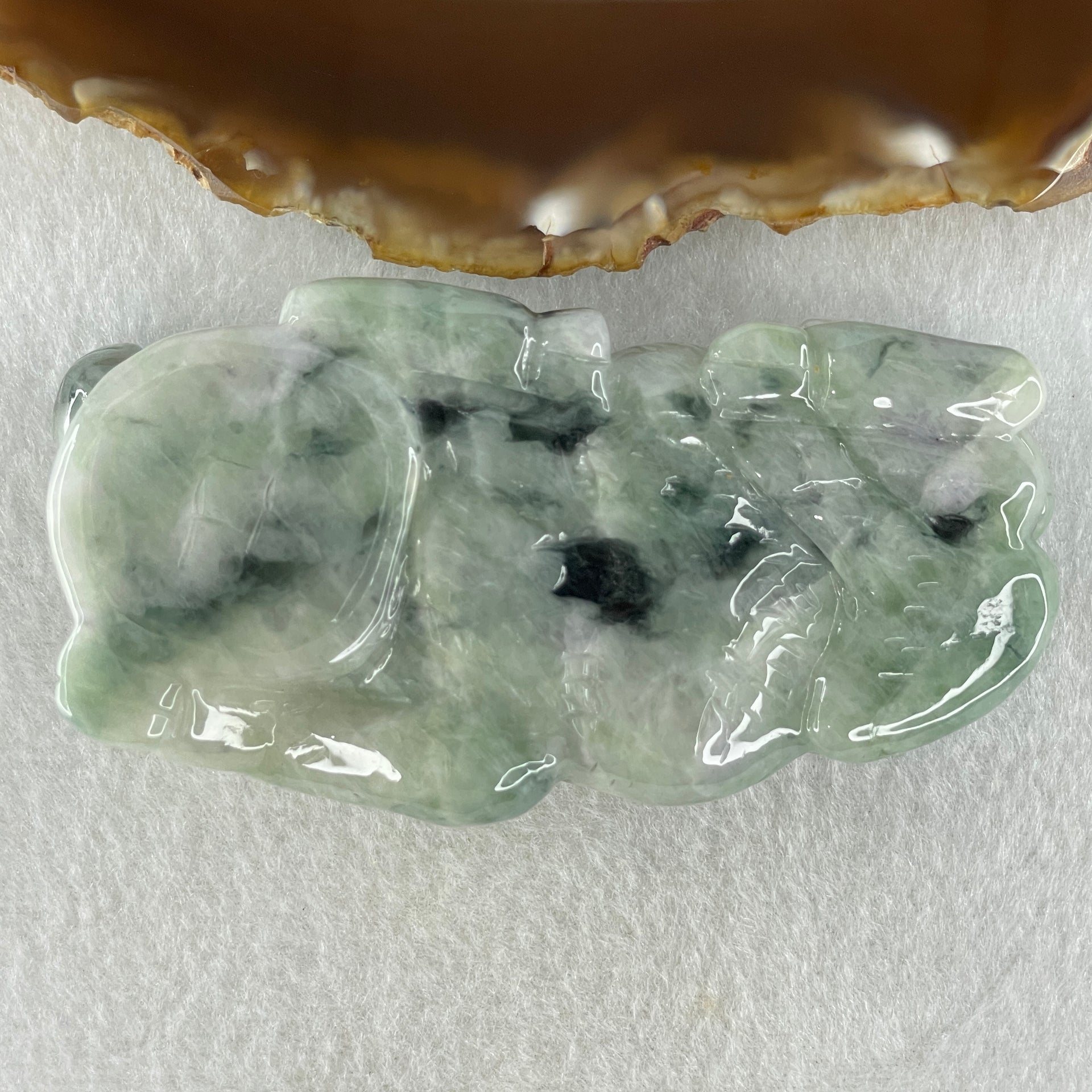 Natural Type A Light Green Light Lavender with Dark Green Patches Jadeite Ox with Wooden Stand Display 341.7g 116.5 by 73.9 by 66.0mm - Huangs Jadeite and Jewelry Pte Ltd