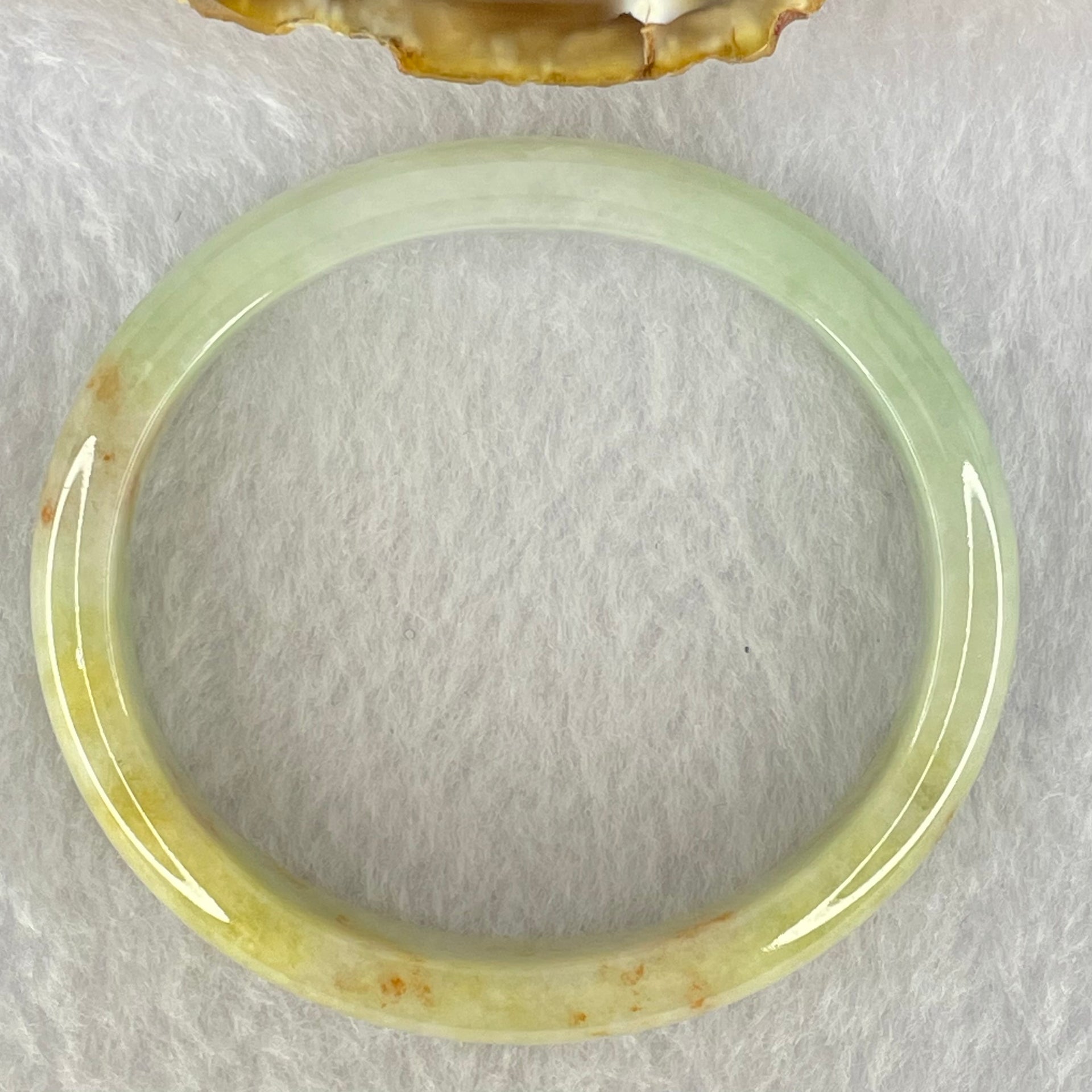 Type A Light Blueish Green and Red and Brown Patches Jadeite Oval Bangle Internal Diameter 54.3mm 32.17g 10.4 by 6.5mm (Very Slight Internal Lines) - Huangs Jadeite and Jewelry Pte Ltd
