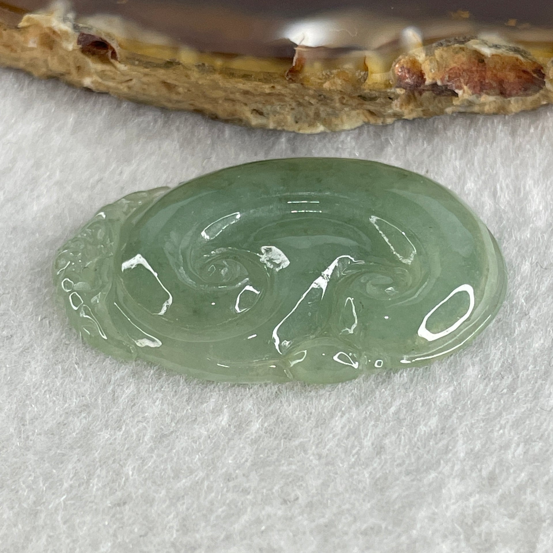 Natural Type A Semi Icy Green Jadeite Monkey on Ruyi Pendant 6.96g 37.6 by 25.5 by 4.4mm - Huangs Jadeite and Jewelry Pte Ltd