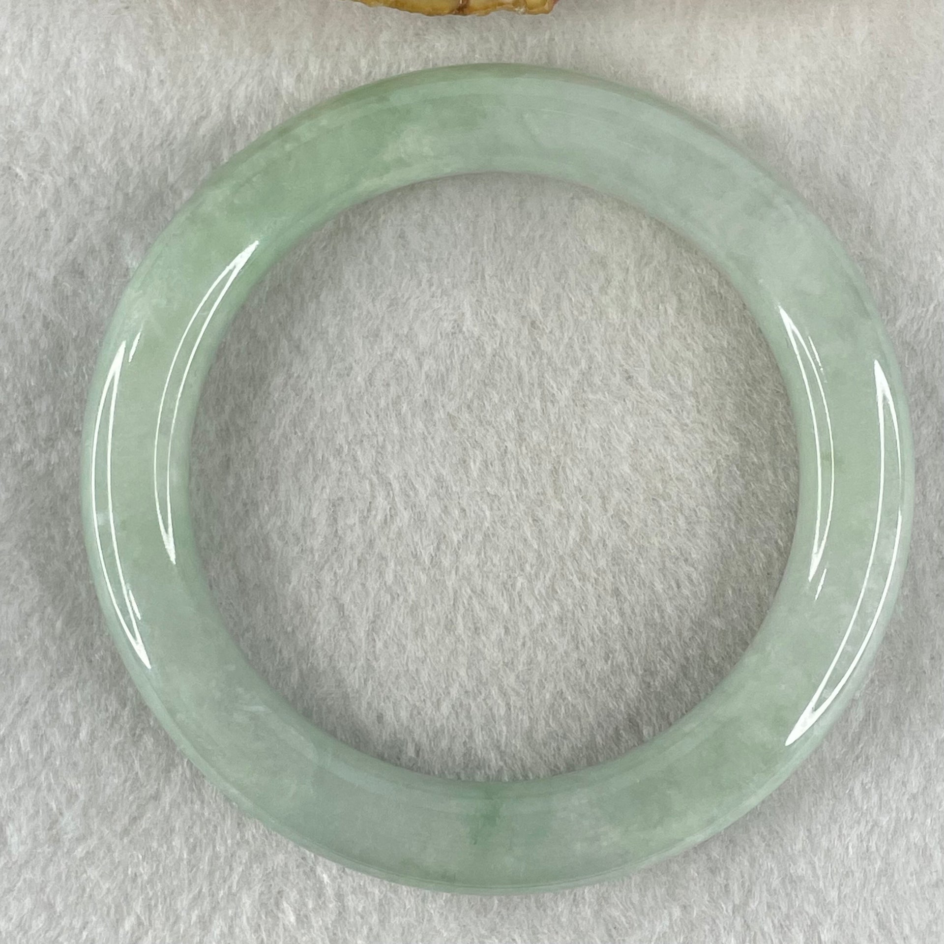 Type A Light Green Jadeite Bangle 61.11g Inner Diameter 58.5mm 10.1 by 10.7mm (Slight Internal Lines) - Huangs Jadeite and Jewelry Pte Ltd