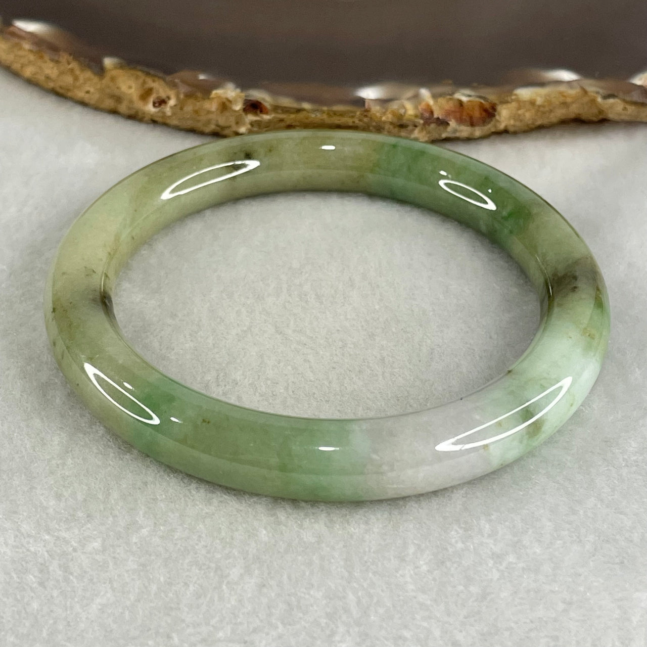 Type A Light Green with Green piao Hua Floral Jadeite Bangle 49.37g Inner Diameter 57.7mm 19.6 by 9.8mm (Very Slight Internal Lines) - Huangs Jadeite and Jewelry Pte Ltd