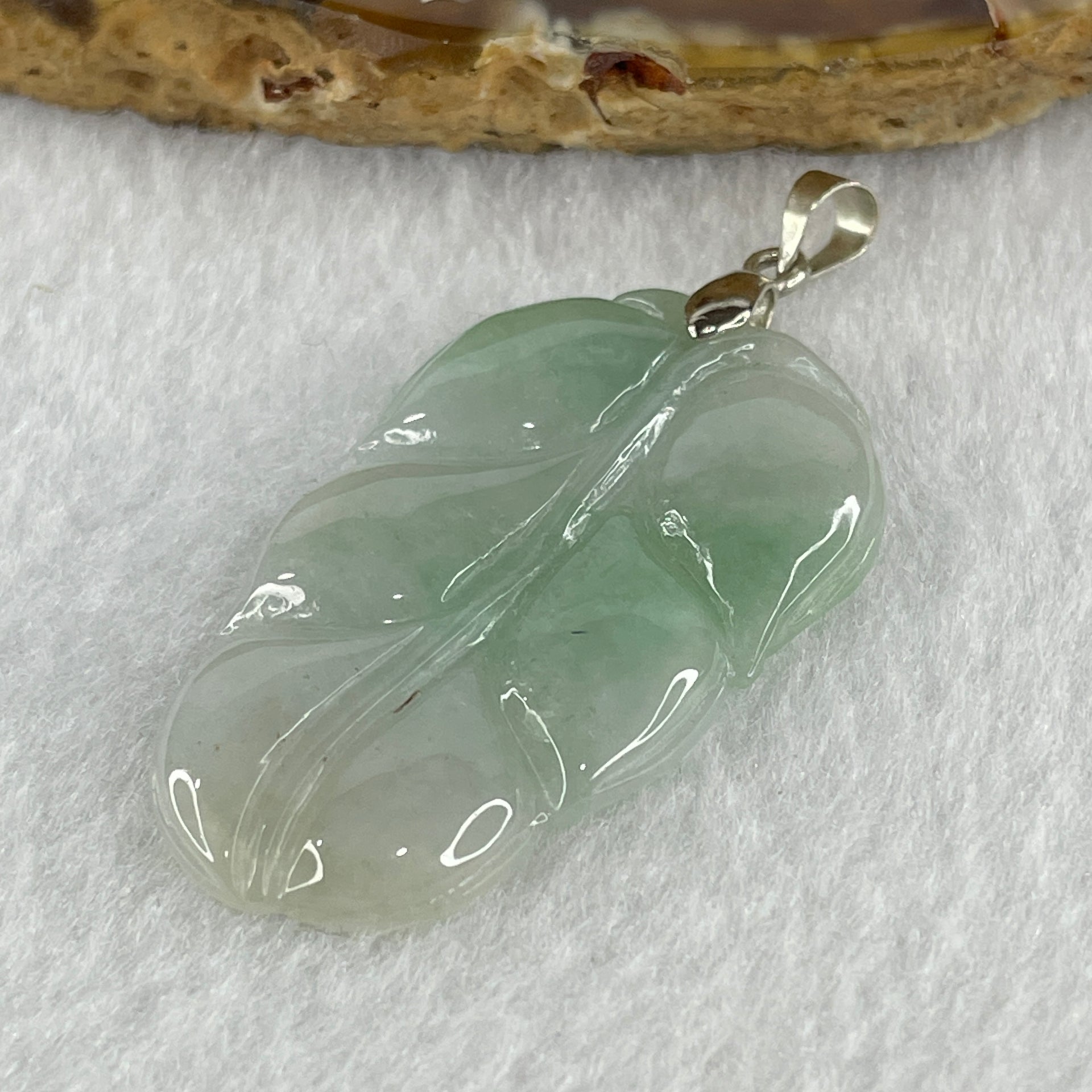 Natural Type A Semi Icy Faint Lavender Light Green Jadeite Prosperity Leaf Pendant in Silver Clasp Signifying Overnight Success 5.93g 39.4 by 23.6 by 3.7mm - Huangs Jadeite and Jewelry Pte Ltd