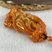 Grandmaster Type A Brownish Orange to Brownish Red Jadeite Melon and Ruyi 福瓜 Pendant 45.95g 58.05 by 34.38 by 15.00mm With NGI Cert 82838787 - Huangs Jadeite and Jewelry Pte Ltd