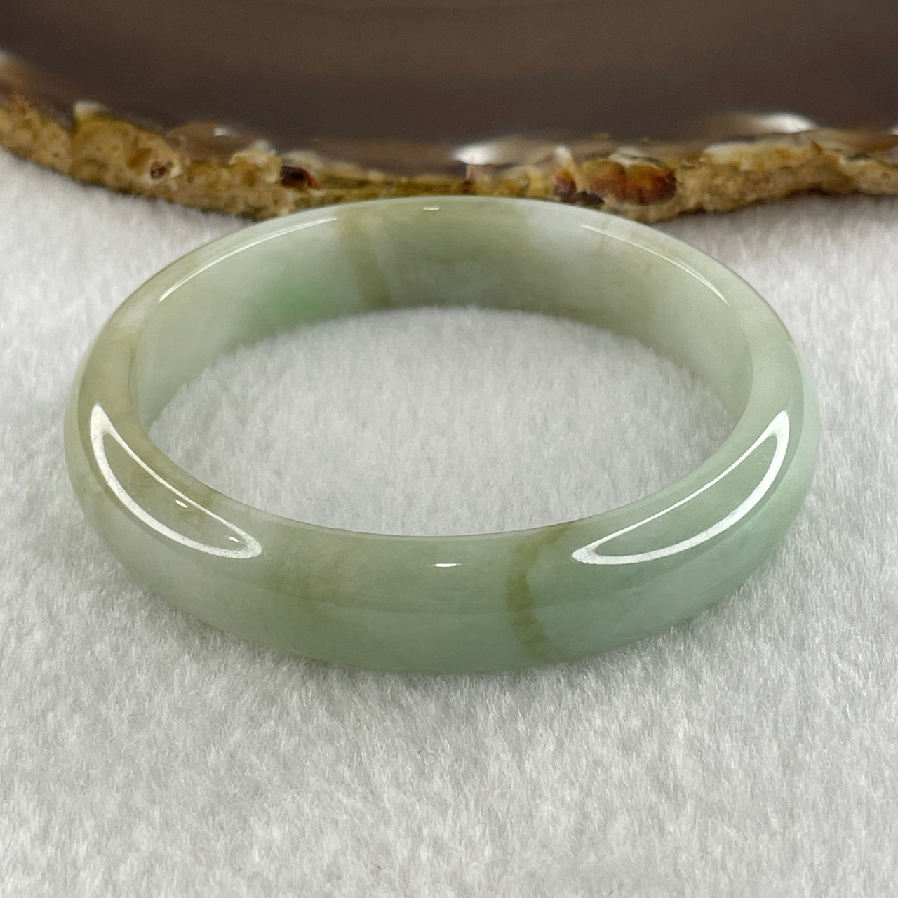 Natural Type A Light Green Faint Lavender Jadeite Oval Bangle 37.26g Inner Diameter 53.8mm 12.2 by 7.0mm (Slight Internal Lines) - Huangs Jadeite and Jewelry Pte Ltd