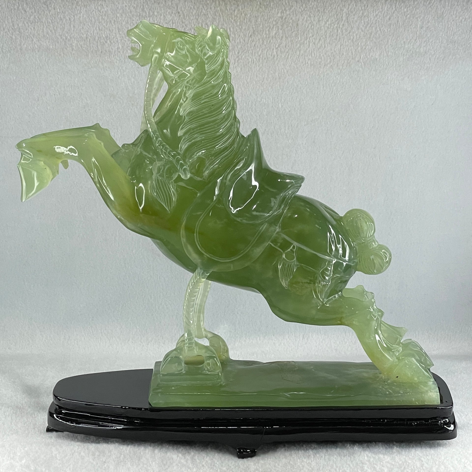 Natural Semi Icy Green Serpentine Victory Horse with Wooden Stand Display 2,644.2g 270.0 by 96.0 by 260.0mm - Huangs Jadeite and Jewelry Pte Ltd