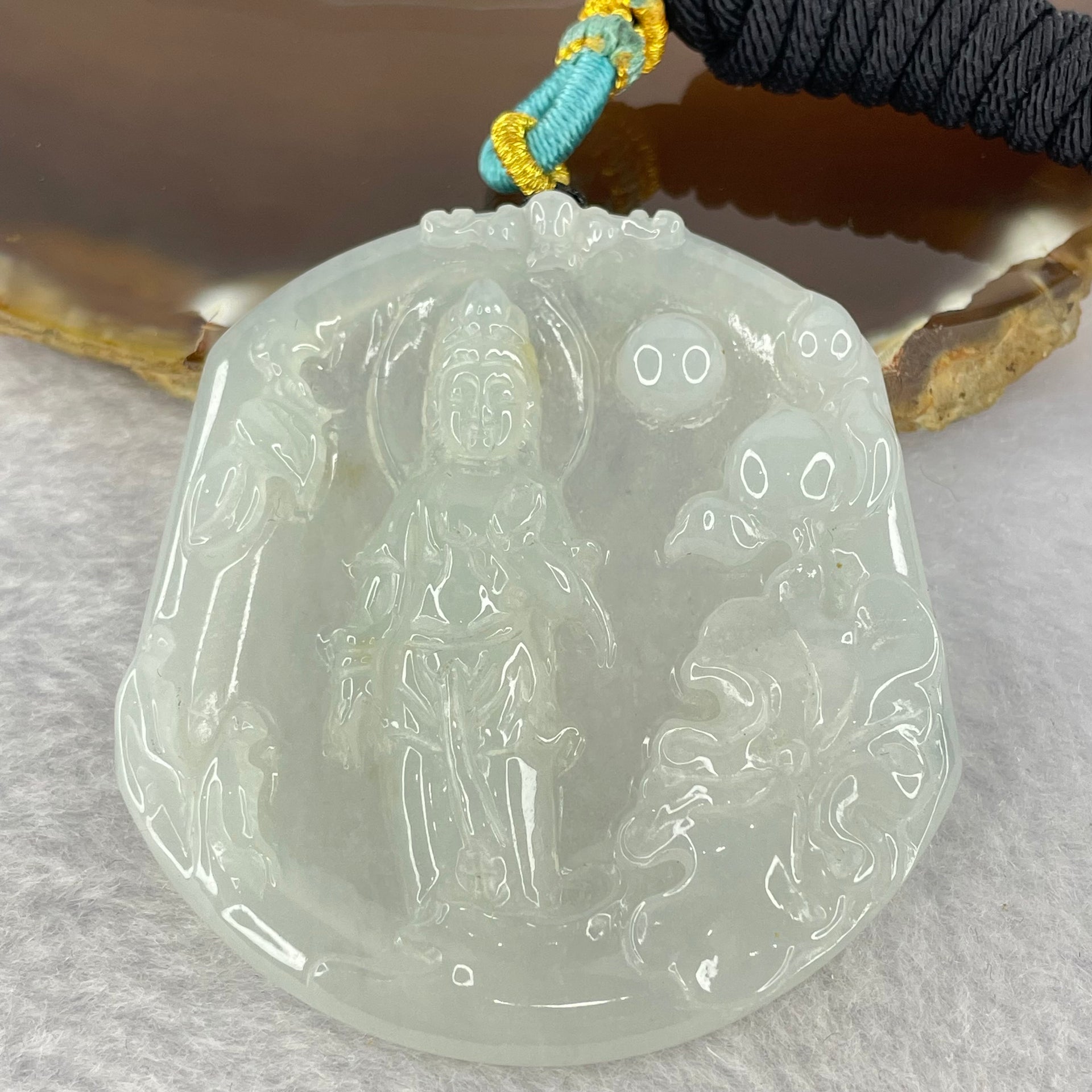 Type A Light Green to white Jadeite Guan Yin Pendent 32.29g 57.8 by 52.6 by 6.6mm - Huangs Jadeite and Jewelry Pte Ltd