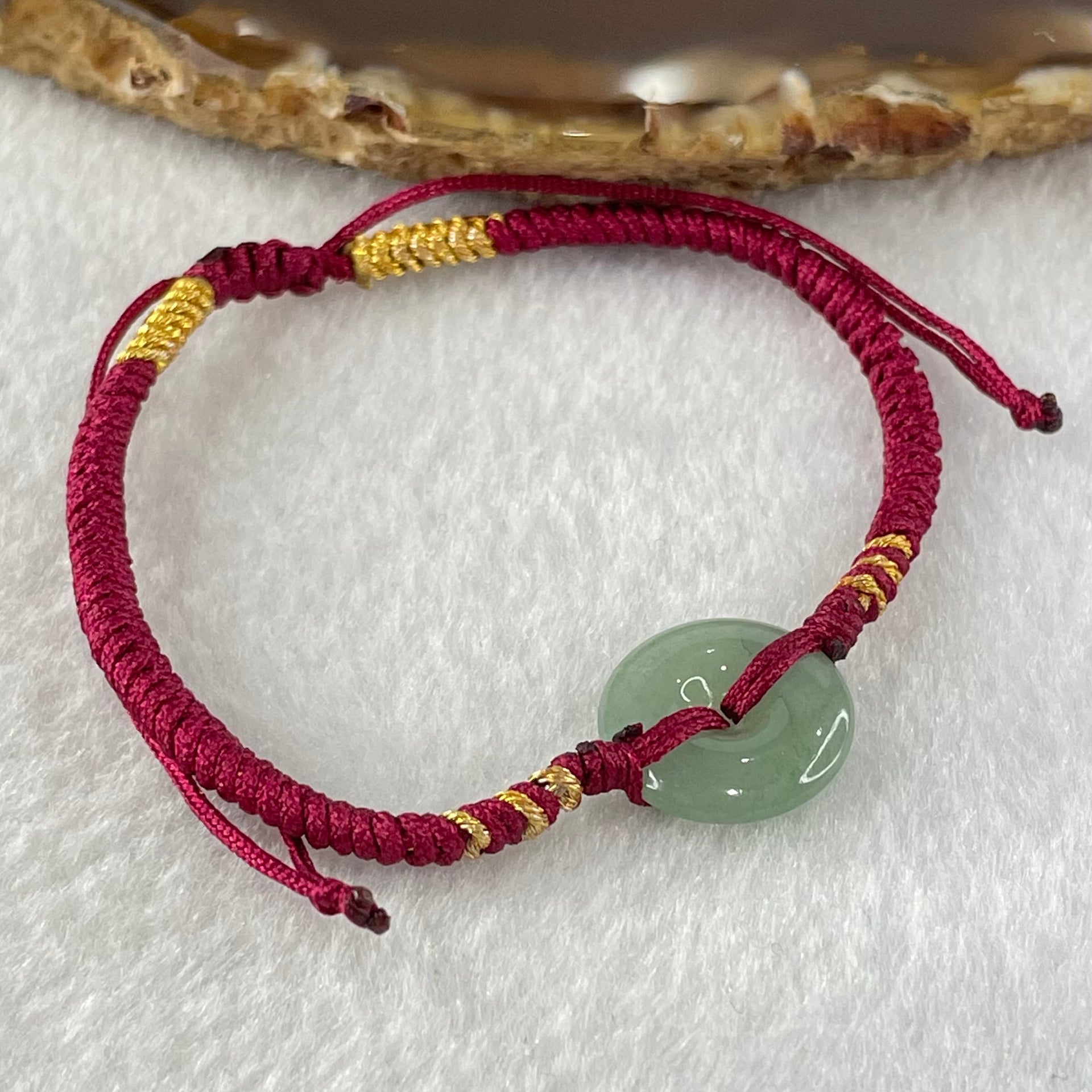 Type A Blueish Green Jadeite Ping An Kou Donut In String Bracelet 2.16g 14.4 by 3.5mm - Huangs Jadeite and Jewelry Pte Ltd