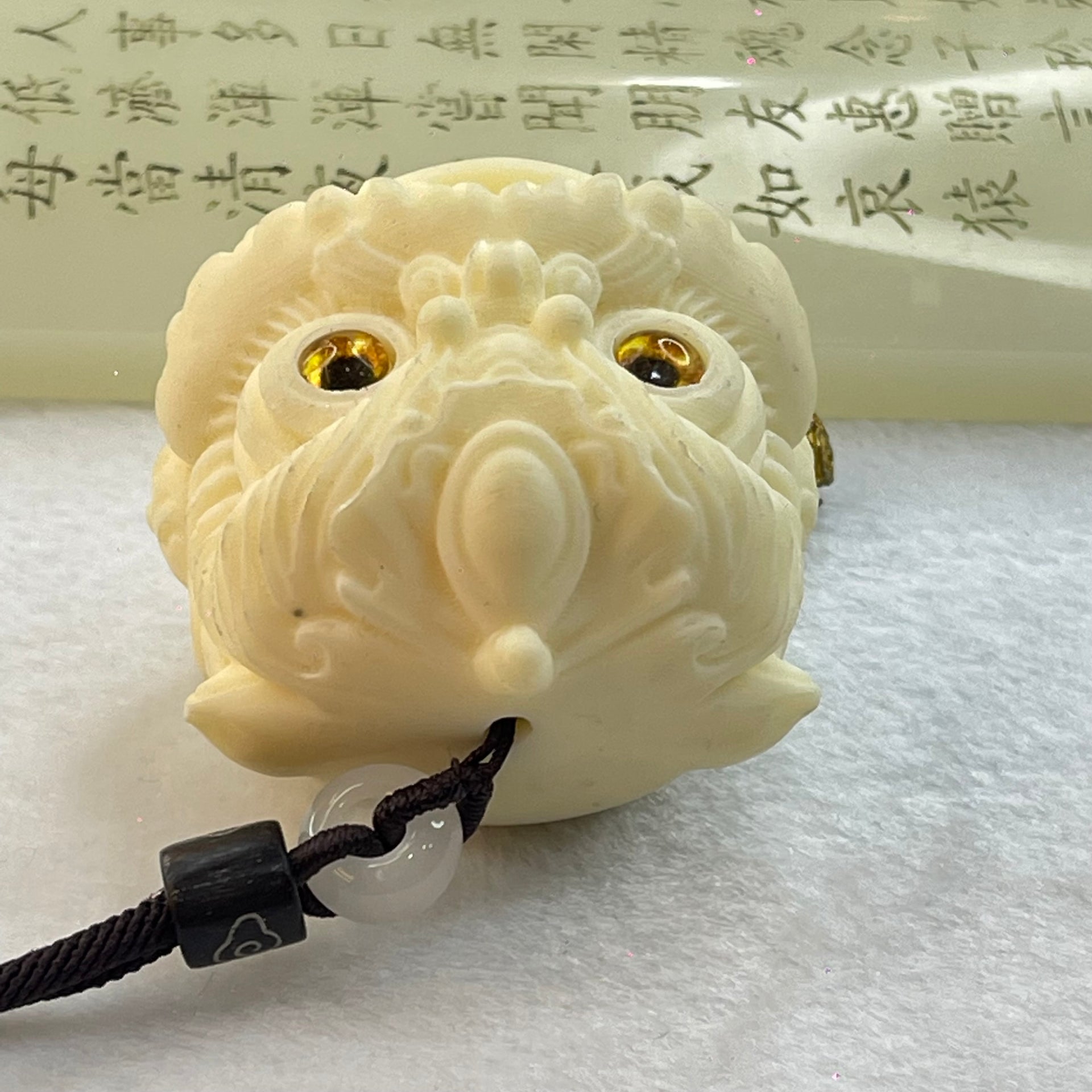 Ivory Fruit Seed Fu Gou Head Display 72.68g 43.1 by 47.0 by 41.7mm - Huangs Jadeite and Jewelry Pte Ltd