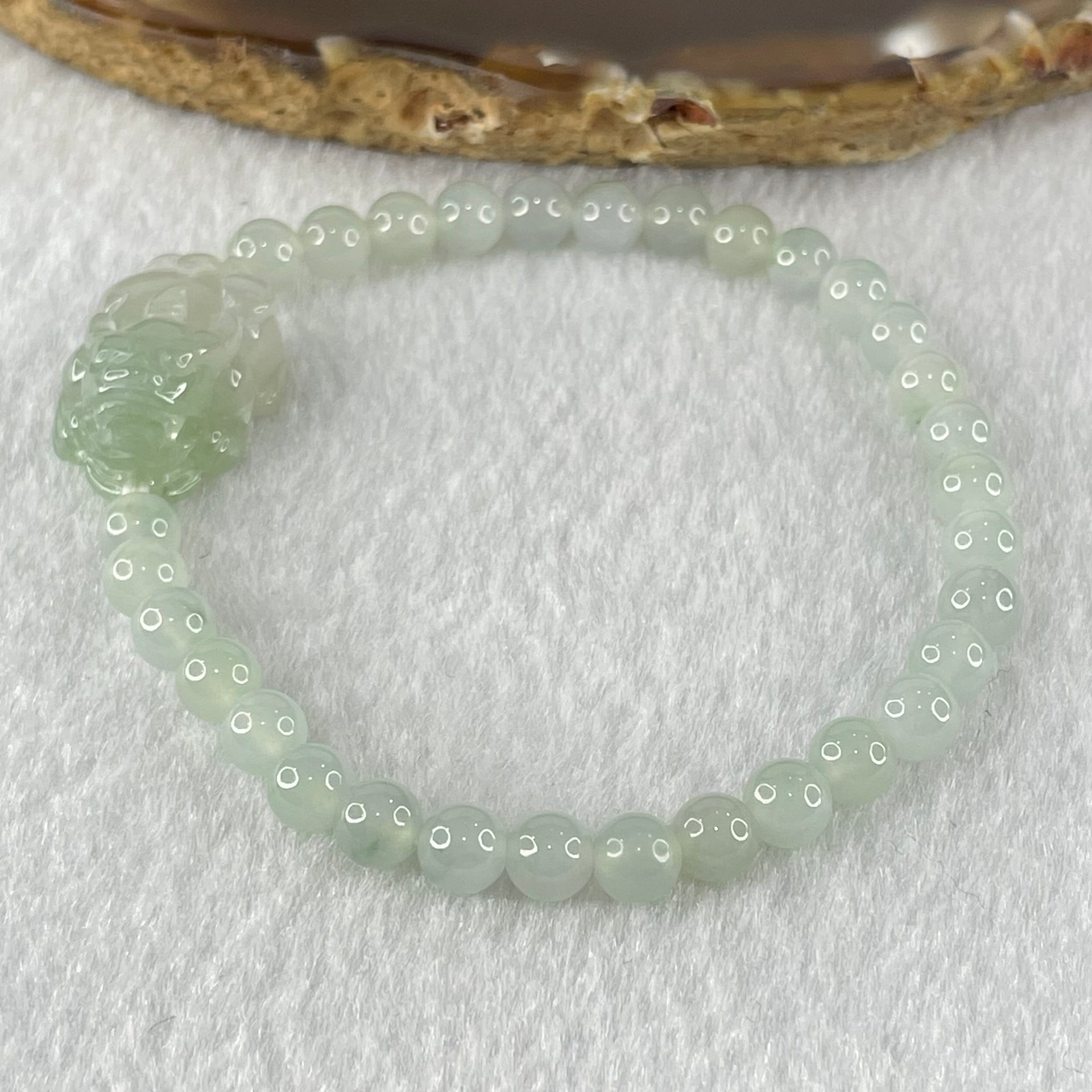 Type A Faint Blueish Green Jadeite Beads with Light Blueish Green Male Pixiu Charm Bracelet 12.93g 15.5cm 5.5cm 31 Beads 21.6 by 14.1 by 10.7mm - Huangs Jadeite and Jewelry Pte Ltd