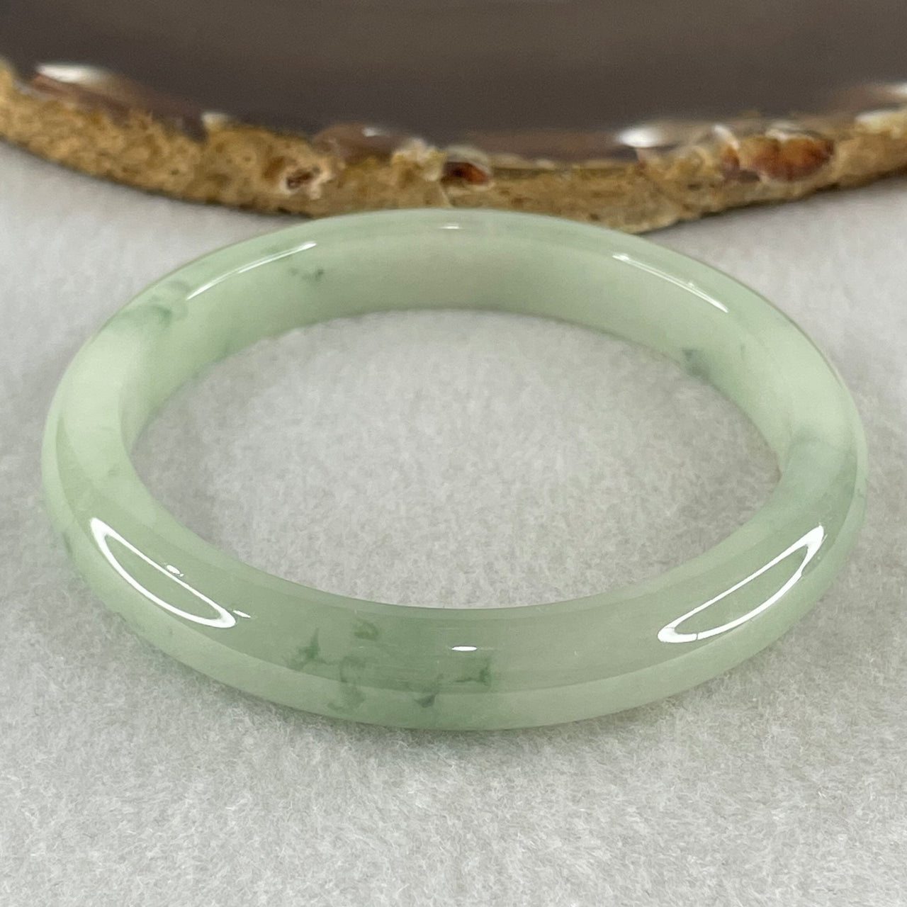Type A Jelly Light Green with Blueish Green Piao Hua Floral Jadeite Bangle 38.24g Inner Diameter 55.8mm 9.4 by 7.2mm (Slight Internal Lines) - Huangs Jadeite and Jewelry Pte Ltd