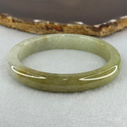 Type A Yellowish Green Lavender Jadeite Oval Bangle Internal Diameter 58.5mm 67.31g 10.7 by 8.1mm (Very Slight Fine Internal Line) - Huangs Jadeite and Jewelry Pte Ltd