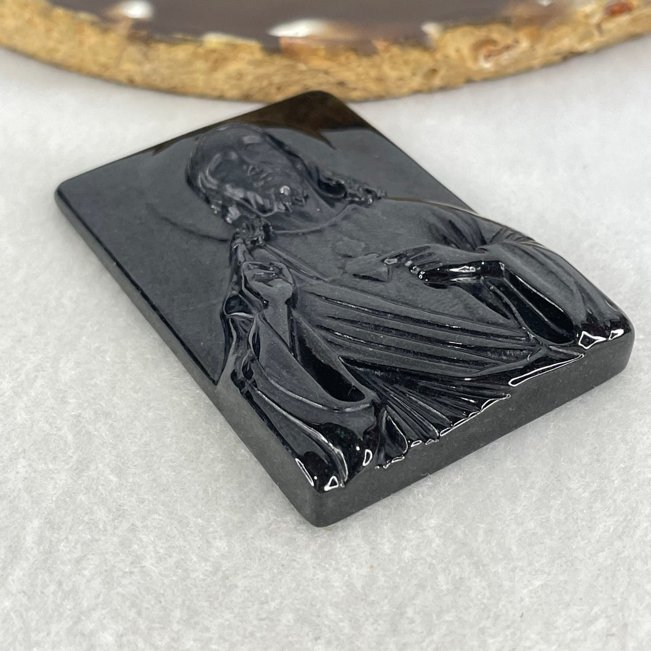 Type A Opaque Black Jadeite Jesus Christ Pendant 45.05g 58.8 by 38.9 by 8.8mm - Huangs Jadeite and Jewelry Pte Ltd