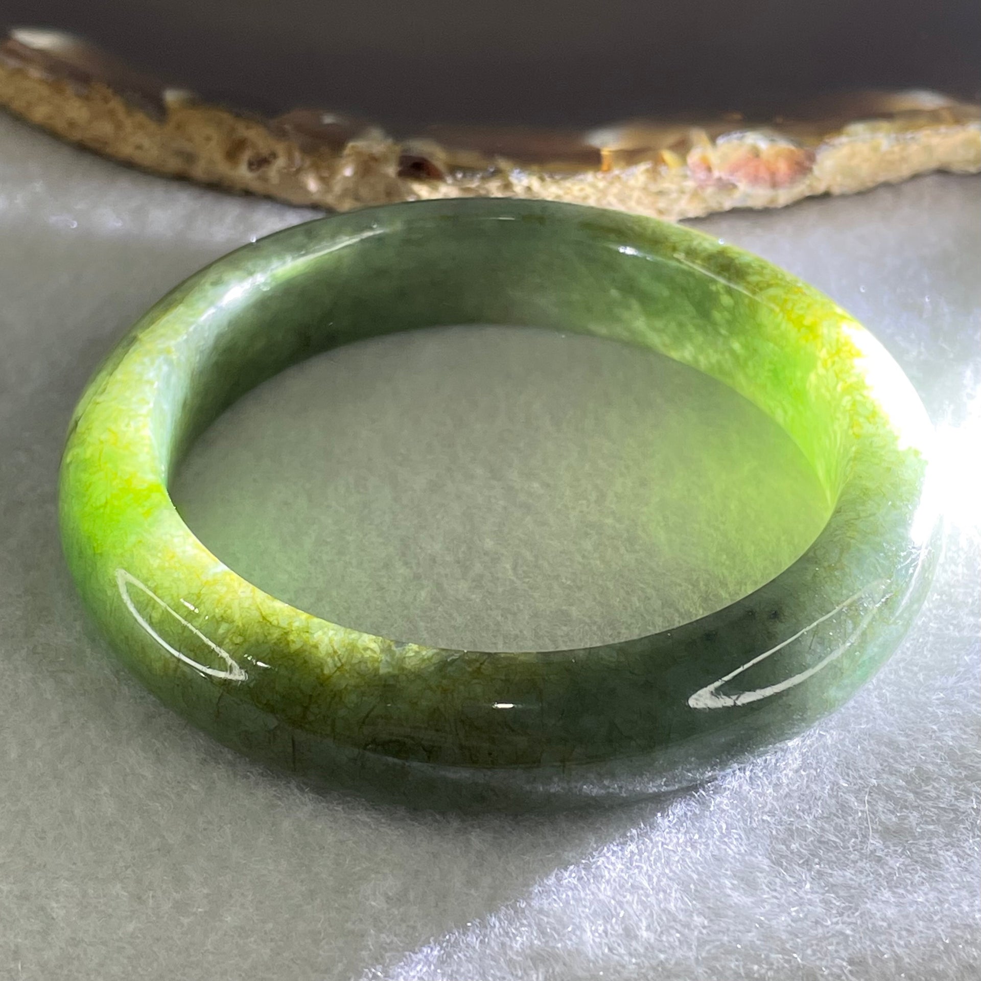 Type A Green with Brown Patches Jadeite Bangle 56.88g Inner Diameter 54.2mm 12.1 by 9.5mm (External and Internal Lines) - Huangs Jadeite and Jewelry Pte Ltd