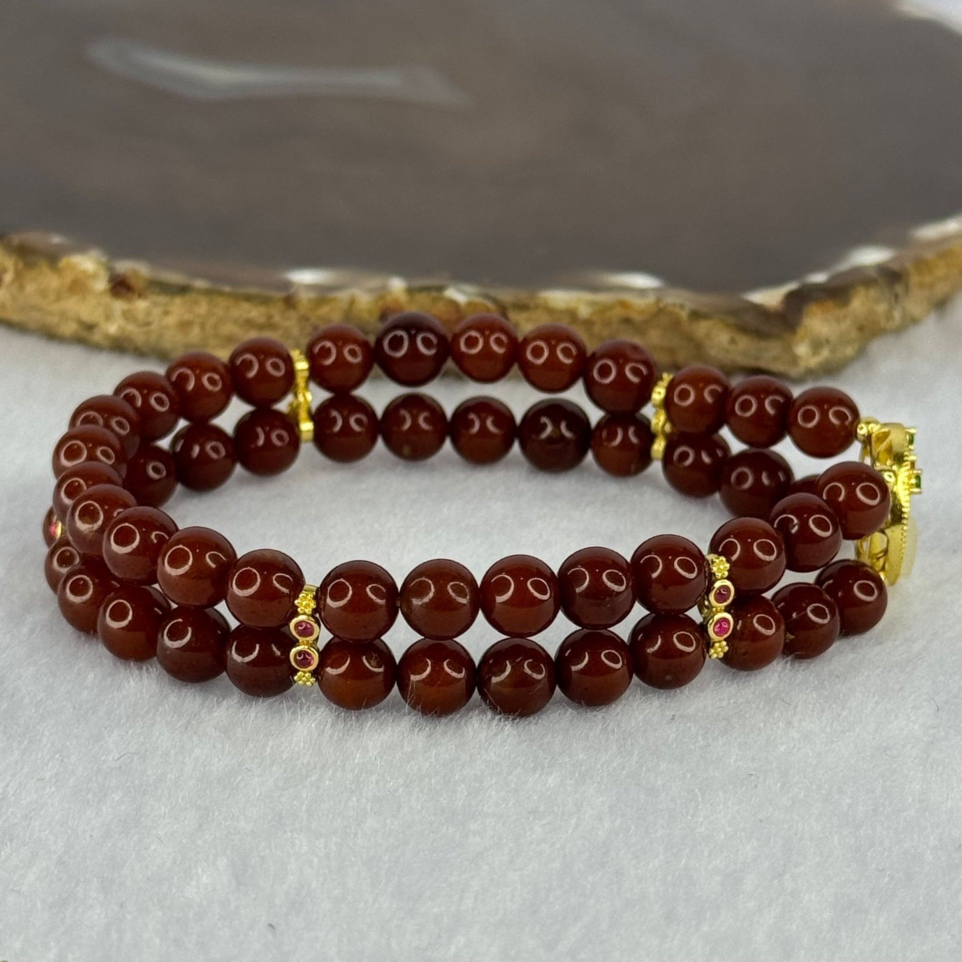 Natural Brownish Red Amber Beads with Gold Color Charms Bracelet 10.69g 16.5cm 6.5mm 52 Beads - Huangs Jadeite and Jewelry Pte Ltd
