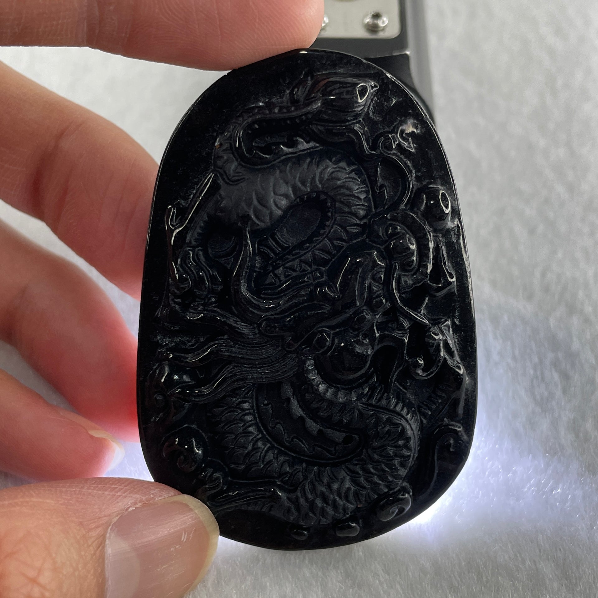 Type A Opaque to Partial Translucent Black Omphacite Jadeite Dragon Pendant 24.58g 58.2 by 40.3 by 8.2mm - Huangs Jadeite and Jewelry Pte Ltd
