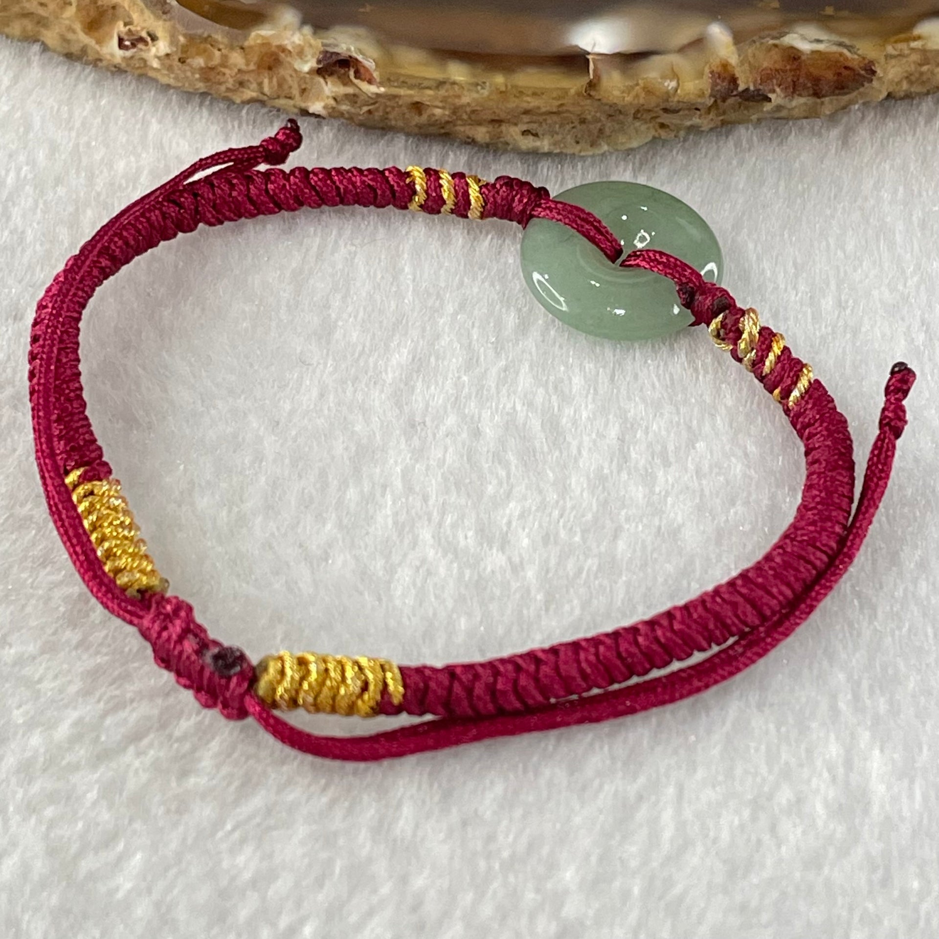 Type A Blueish Green Jadeite Ping An Kou Donut In String Bracelet 2.16g 14.4 by 3.5mm - Huangs Jadeite and Jewelry Pte Ltd