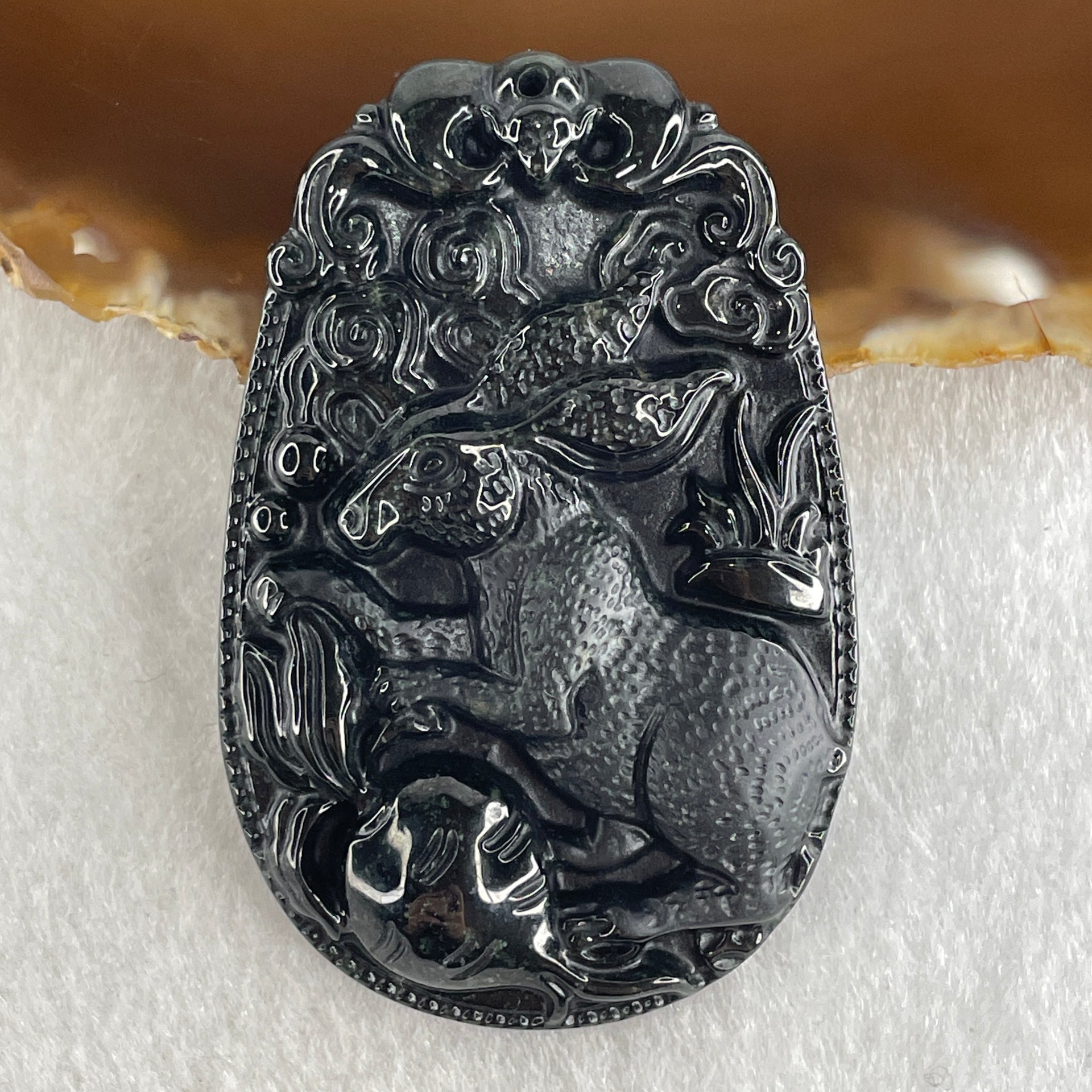 Type A Opaque to Partial Translucent Black Omphacite Jadeite Rabbit Pendant 25.89g 60.2 by 39.8 by 8.9mm - Huangs Jadeite and Jewelry Pte Ltd