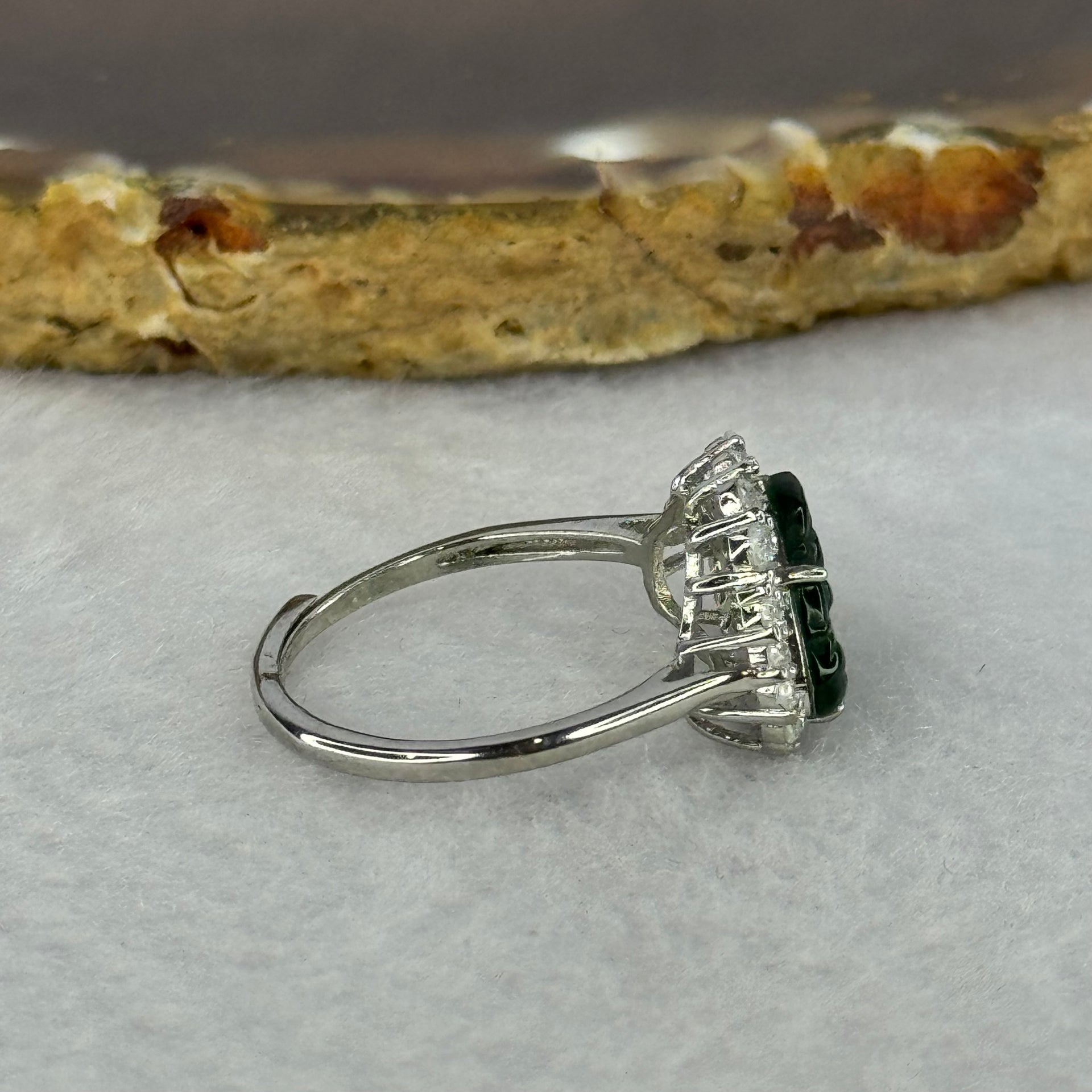 Type A Icy Green Omphasite Jadeite Milo Buddha with Crystals in Sliver Ring (Adjustable Size) 1.82g 8.9 by 13.2 by 2.5mm - Huangs Jadeite and Jewelry Pte Ltd
