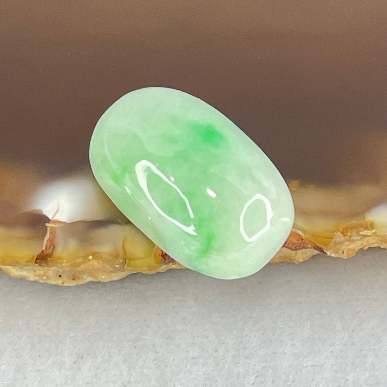 Type A Light Green with Apple Green Patches Jadeite Oval Cabouchon Stone For Setting 2.90g 17.2 by 10.2 by 7.7mm - Huangs Jadeite and Jewelry Pte Ltd