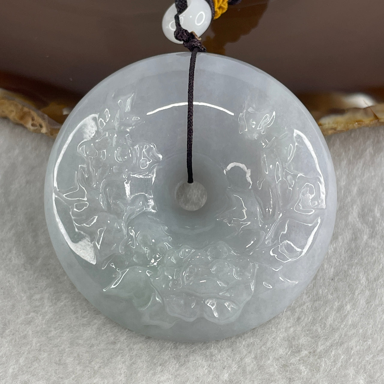 Natural Type A Faint Lavender Jadeite Donut with Flower Caving Pendant 81.69g 53.2 by 15.2mm - Huangs Jadeite and Jewelry Pte Ltd