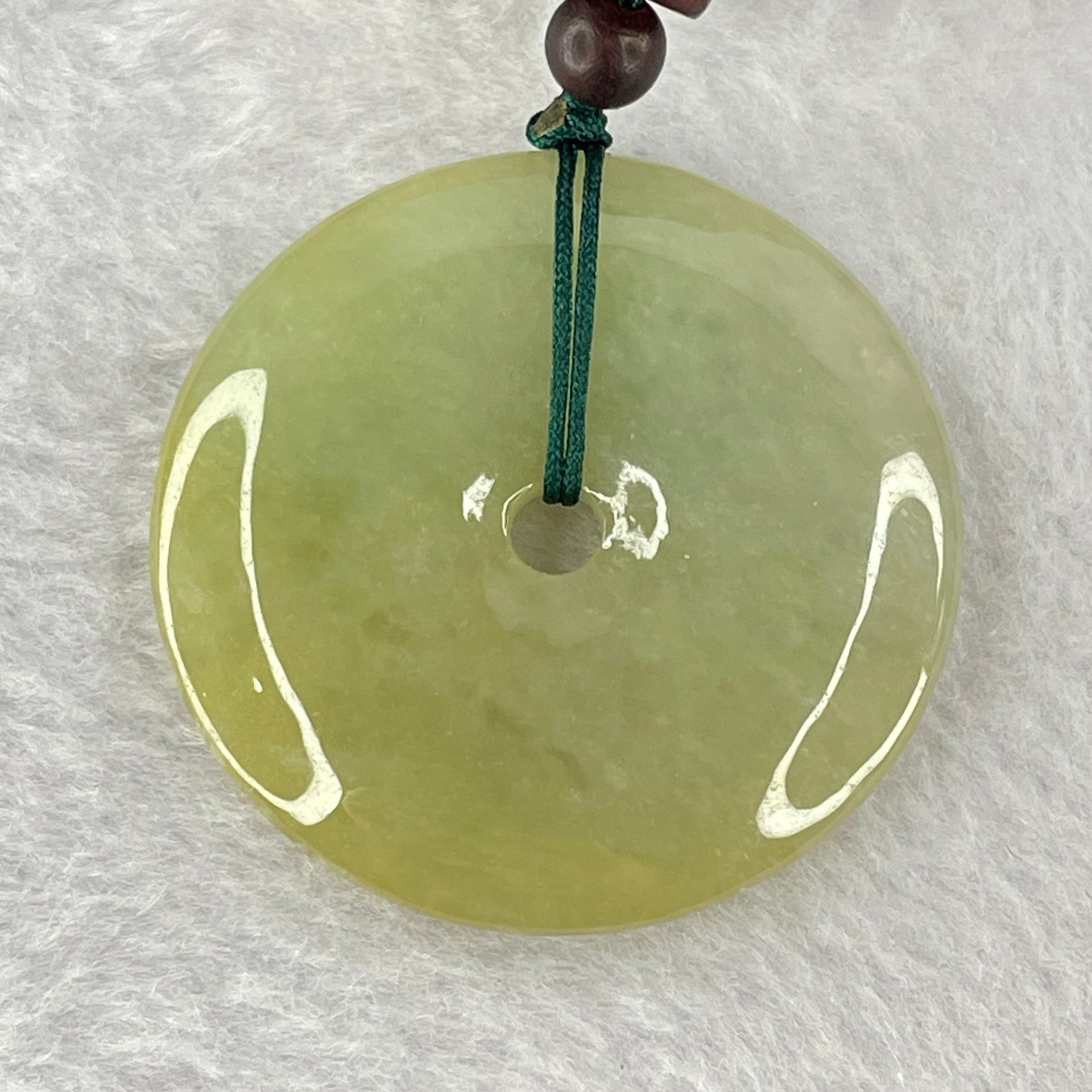 Type A Yellowish Green Jadeite Ping An Kou Donut Pendent 24.41g 43.0 by 7.1mm - Huangs Jadeite and Jewelry Pte Ltd