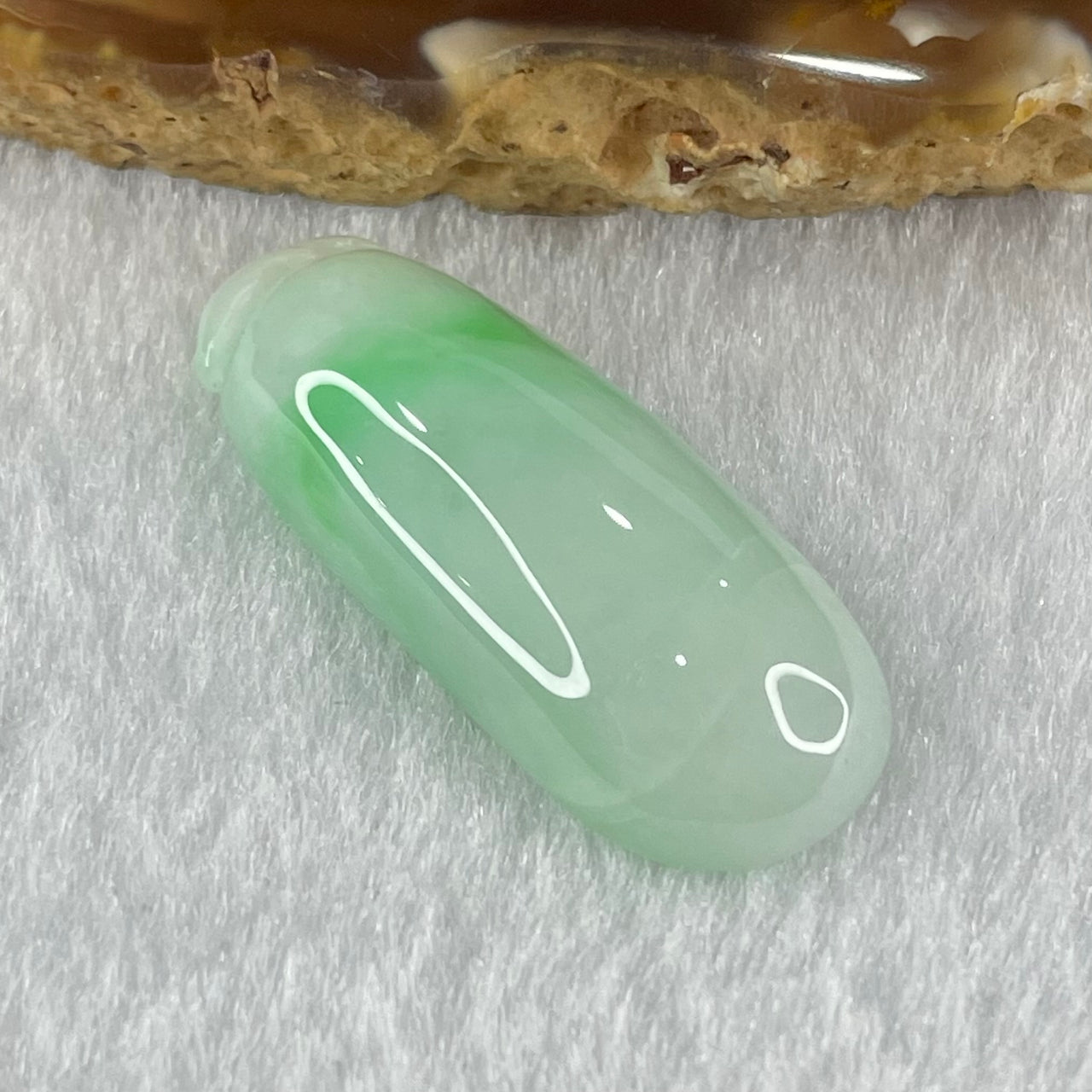 Type A Faint Lavender Green with Apple Green Vein Jadeite Melon Pendant 5.52g 31.0 by 12.4 by 7.2mm - Huangs Jadeite and Jewelry Pte Ltd