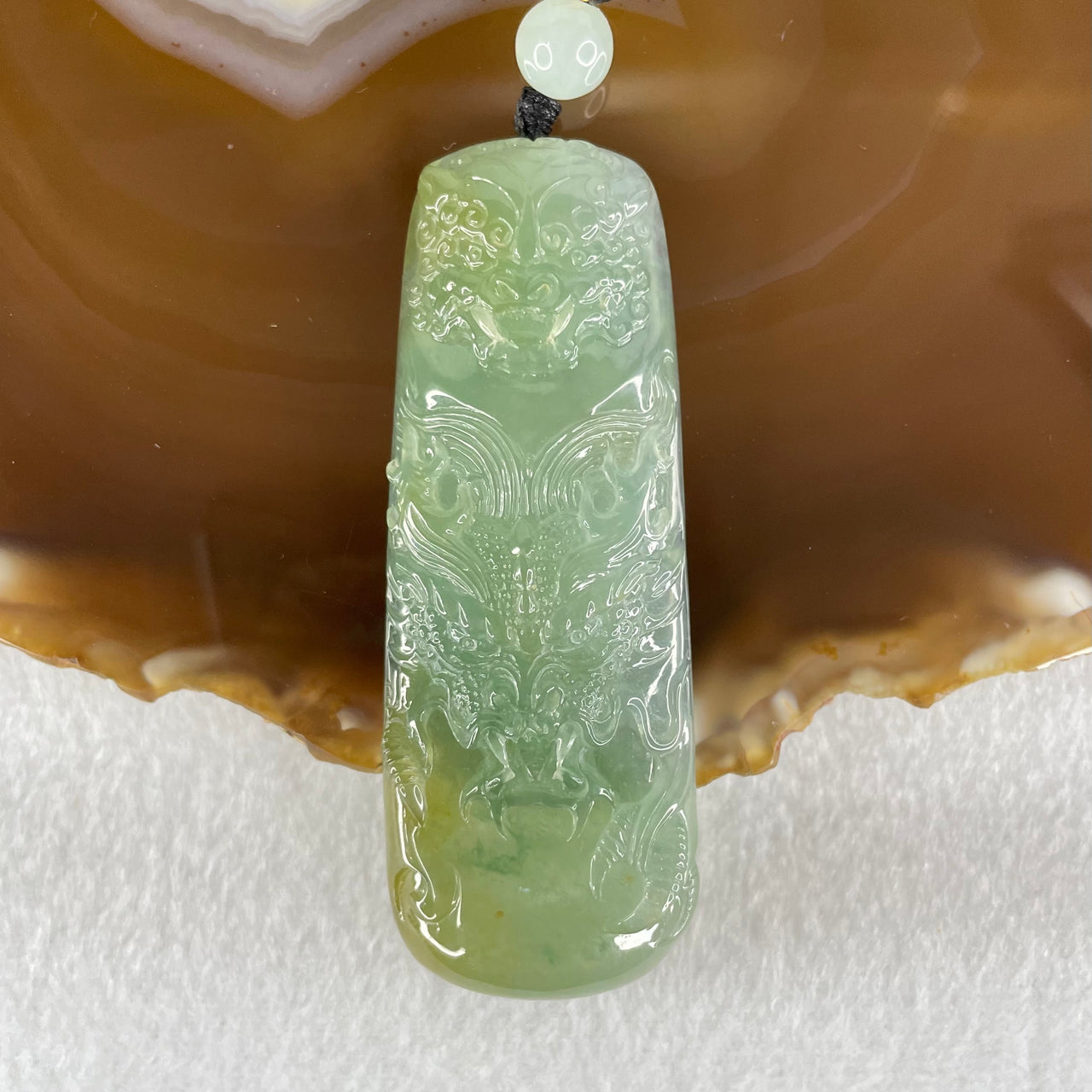Grandmaster Type A Icy Blueish Green Jadeite Fu Gou on Dragon Pendant 30.95g 68 by 25 by 9.3mm - Huangs Jadeite and Jewelry Pte Ltd