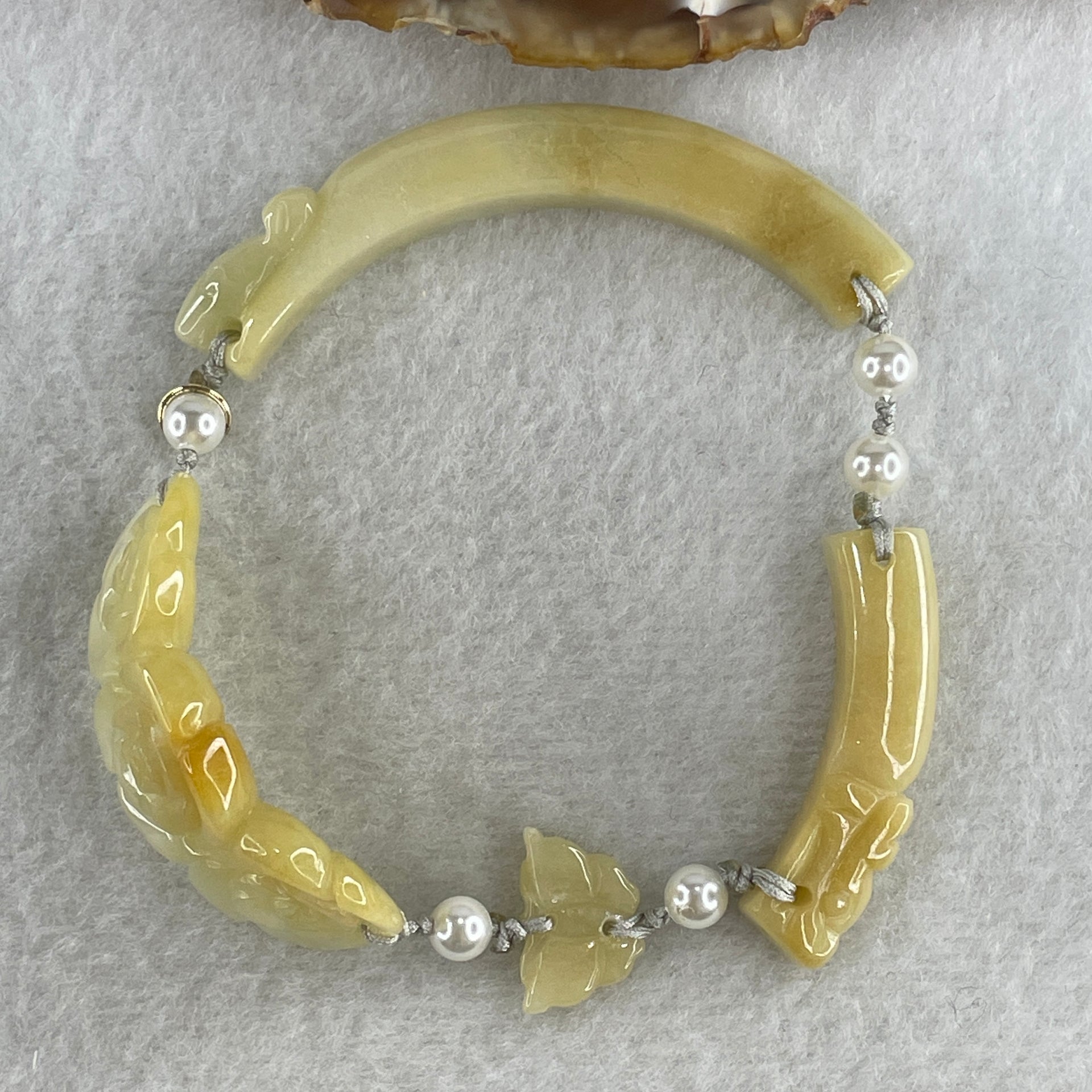 Natural Type A Light Yellowish with Light Green Jadeite Flowers with Dragon Head and Butterfly Bracelet 25.67g 7.2 by 8.4mm - Flower 40.4 by 16.5 by 6.1mm - Huangs Jadeite and Jewelry Pte Ltd