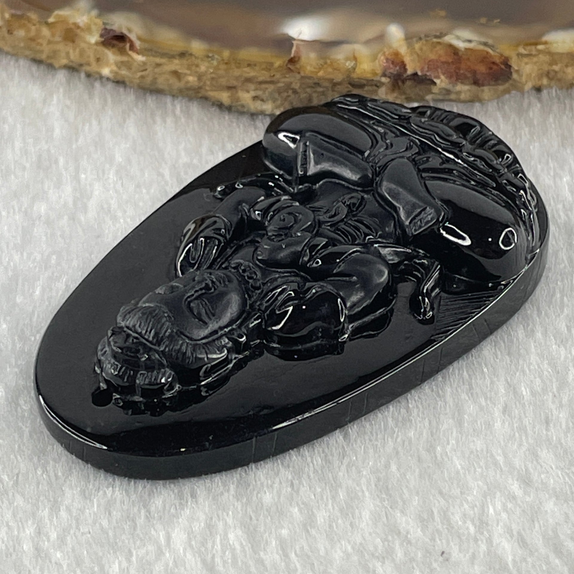 Type A Opaque to Partial Translucent Black Omphacite Jadeite Da ri ru lai 大日如來 Vairocana Buddha Pendant Goat and Monkey Zodiac Guardian 17.20g 53.0 by 32.9 by 9.6mm - Huangs Jadeite and Jewelry Pte Ltd