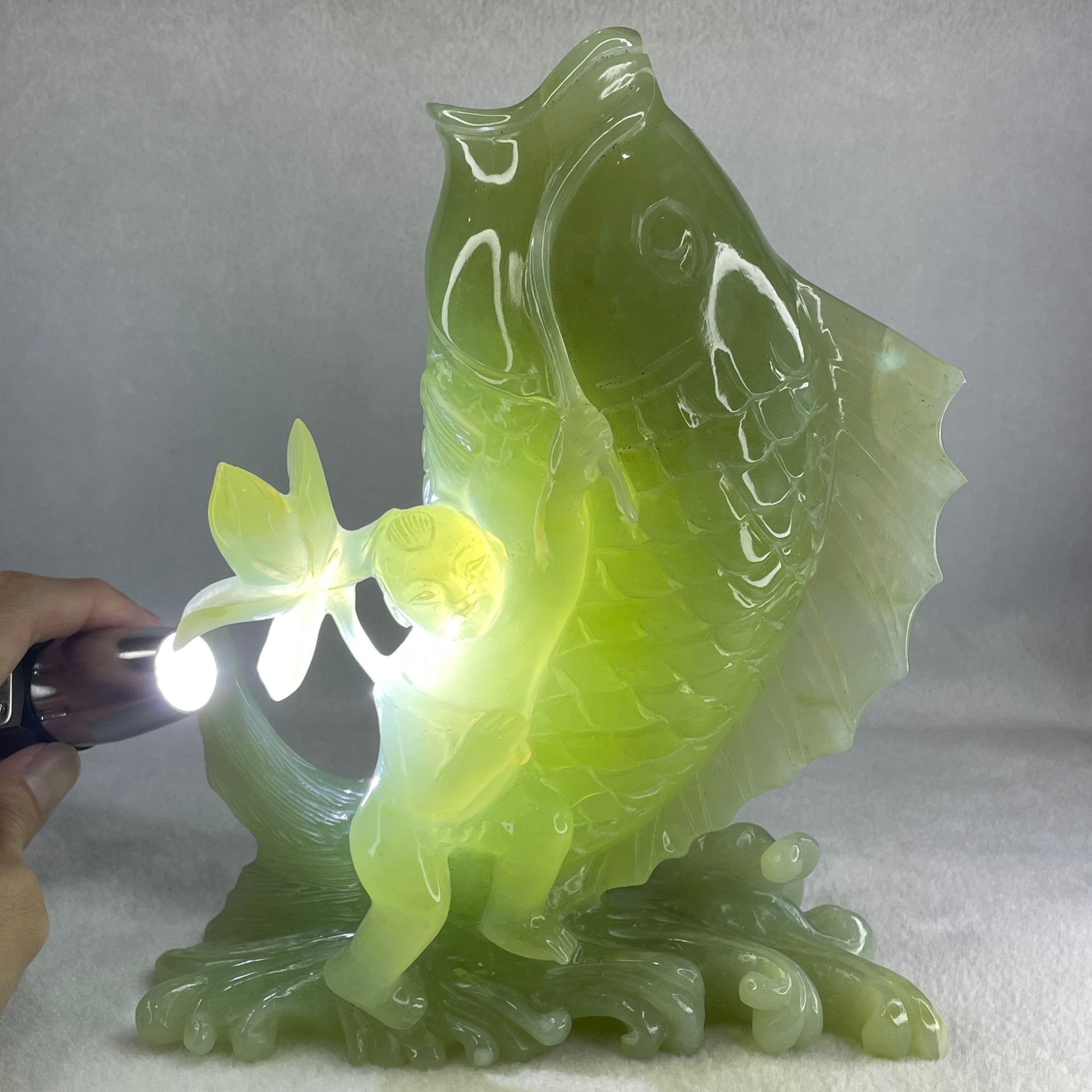 Natural Green Serpentine Carp Fish with Gui ren and Lotus with Wooden Stand Display 2277.9g 215.0 by 120.0 by 250.0mm - Huangs Jadeite and Jewelry Pte Ltd