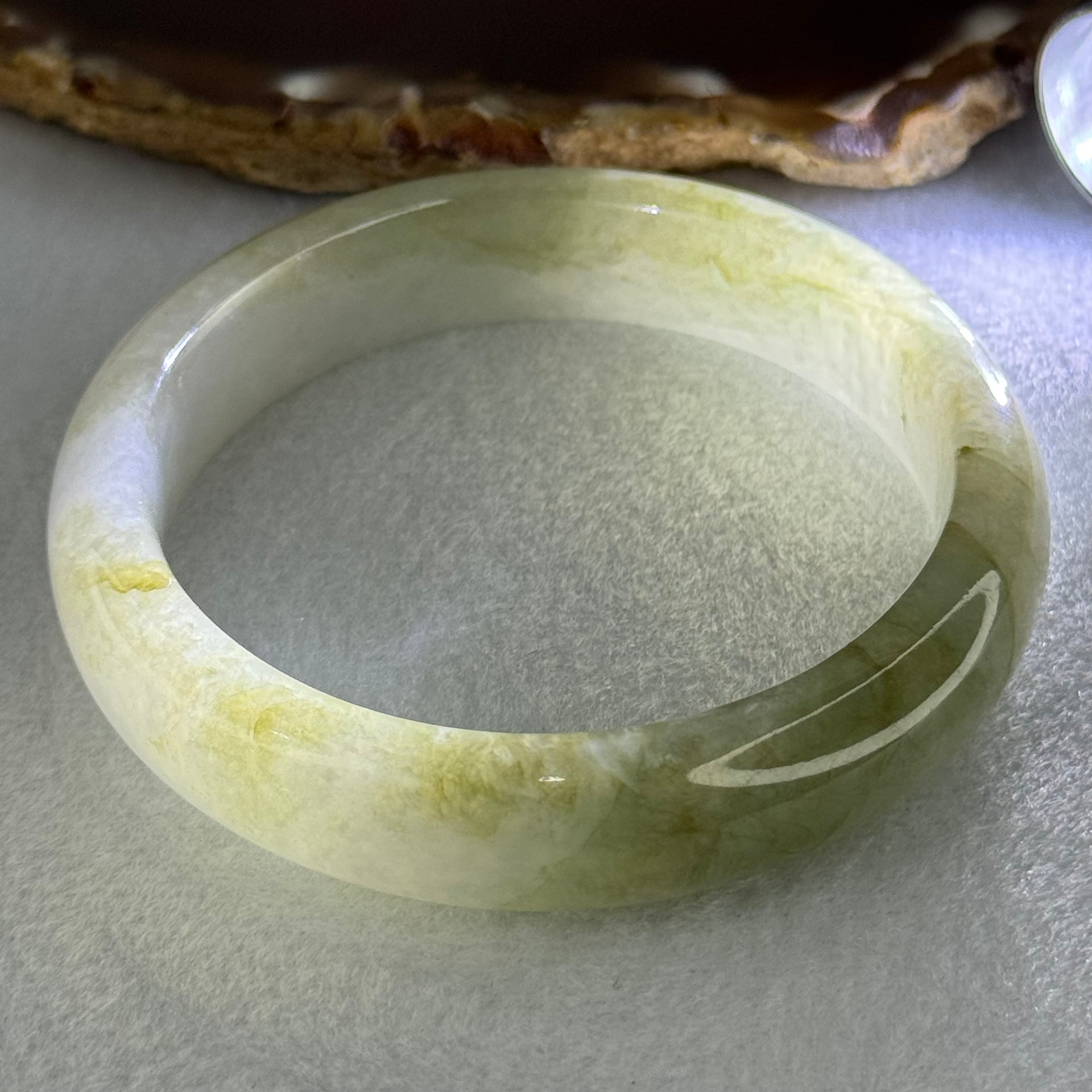 Type A Green Patches with Faint Pinkish Lavender Jadeite Bangle Internal Diameter 56.6mm 59.85g 14.1 by 8.4mm (External Lines) - Huangs Jadeite and Jewelry Pte Ltd