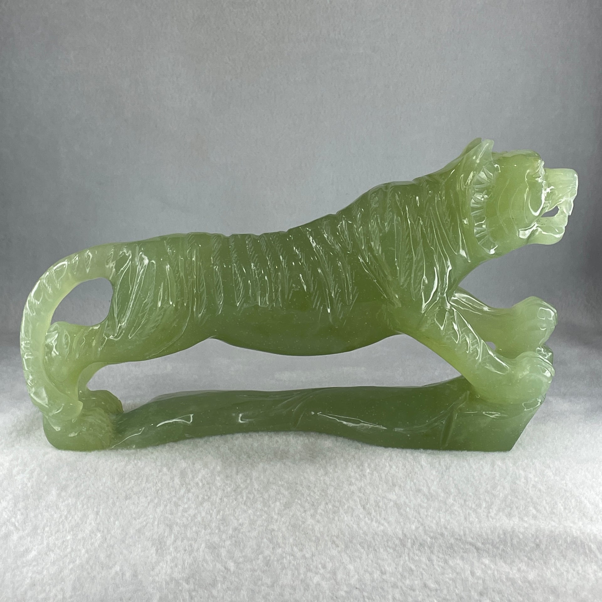 Natural Green Serpentine Tiger with Wooden Stand Display 1711.3g 255.0 by 90.0 by 160.0mm - Huangs Jadeite and Jewelry Pte Ltd